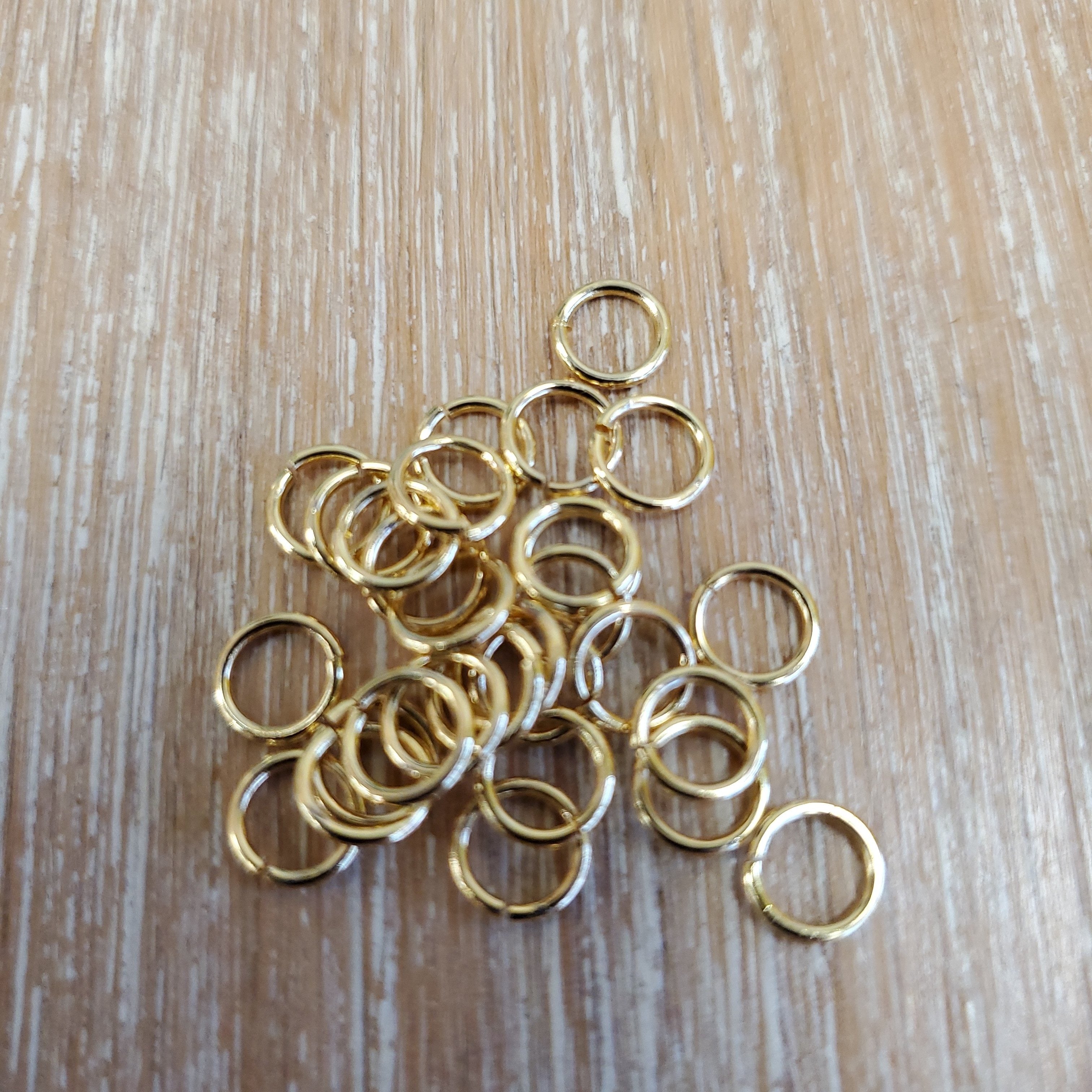 Brass Gold Plated Unsoldered Gold Jump Rings 7X0.8mm | Bellaire Wholesale