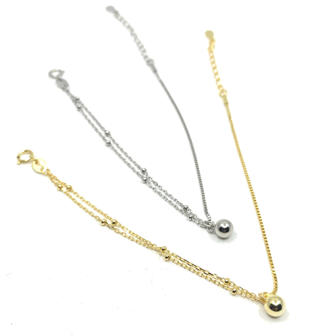 Half Box Chain and Half Ball Chain Bracelet in 2 options: Silver and gold. Made from sterling silver.