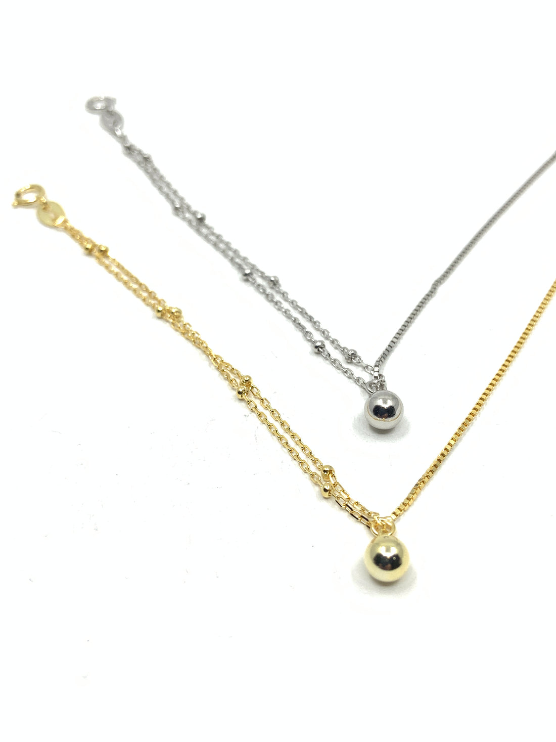 Half Box Chain and Half Ball Chain Bracelet in 2 options: Silver and gold. Made from sterling silver.