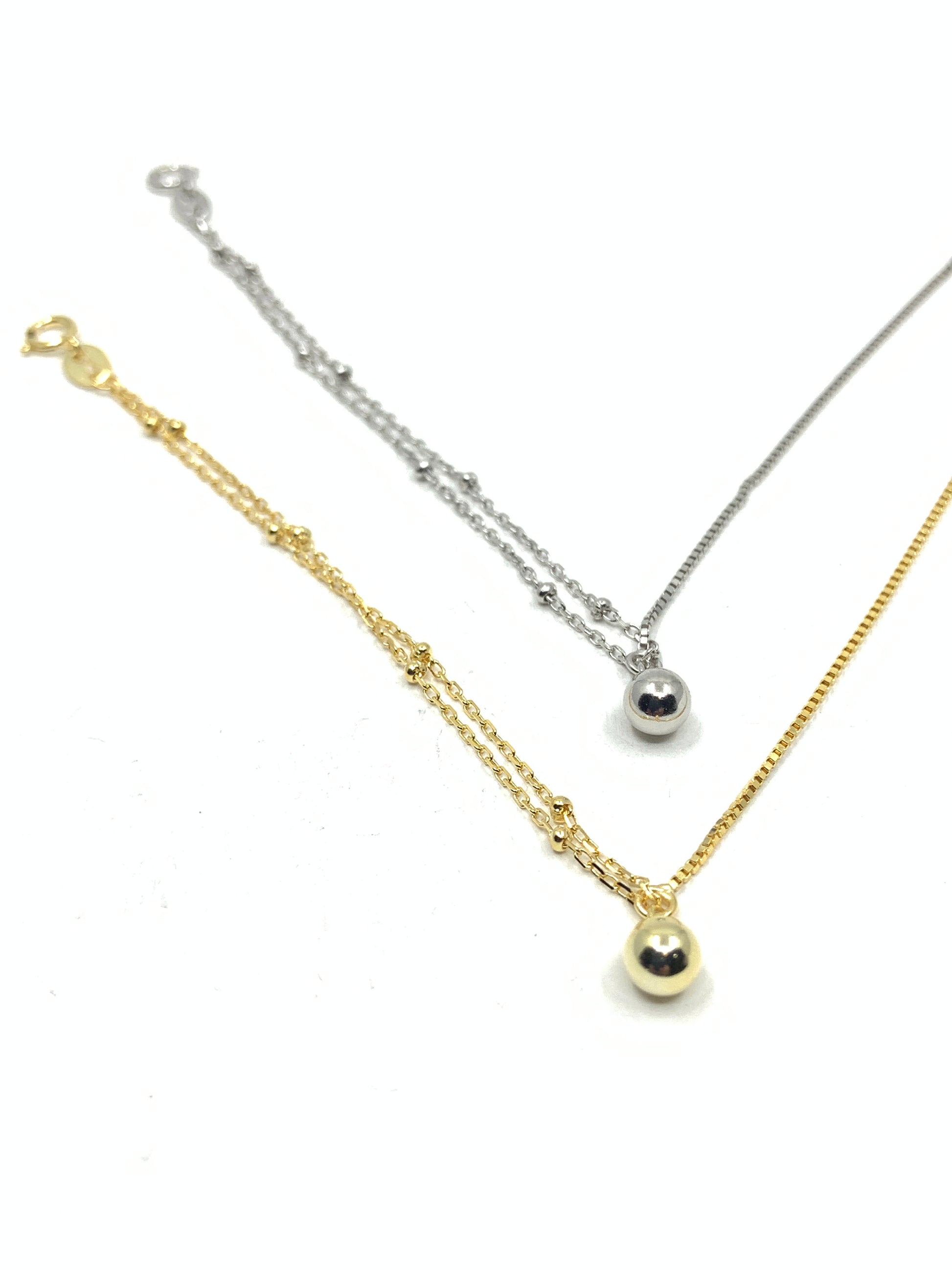 Half Box Chain and Half Ball Chain Bracelet in 2 options: Silver and gold. Made from sterling silver.