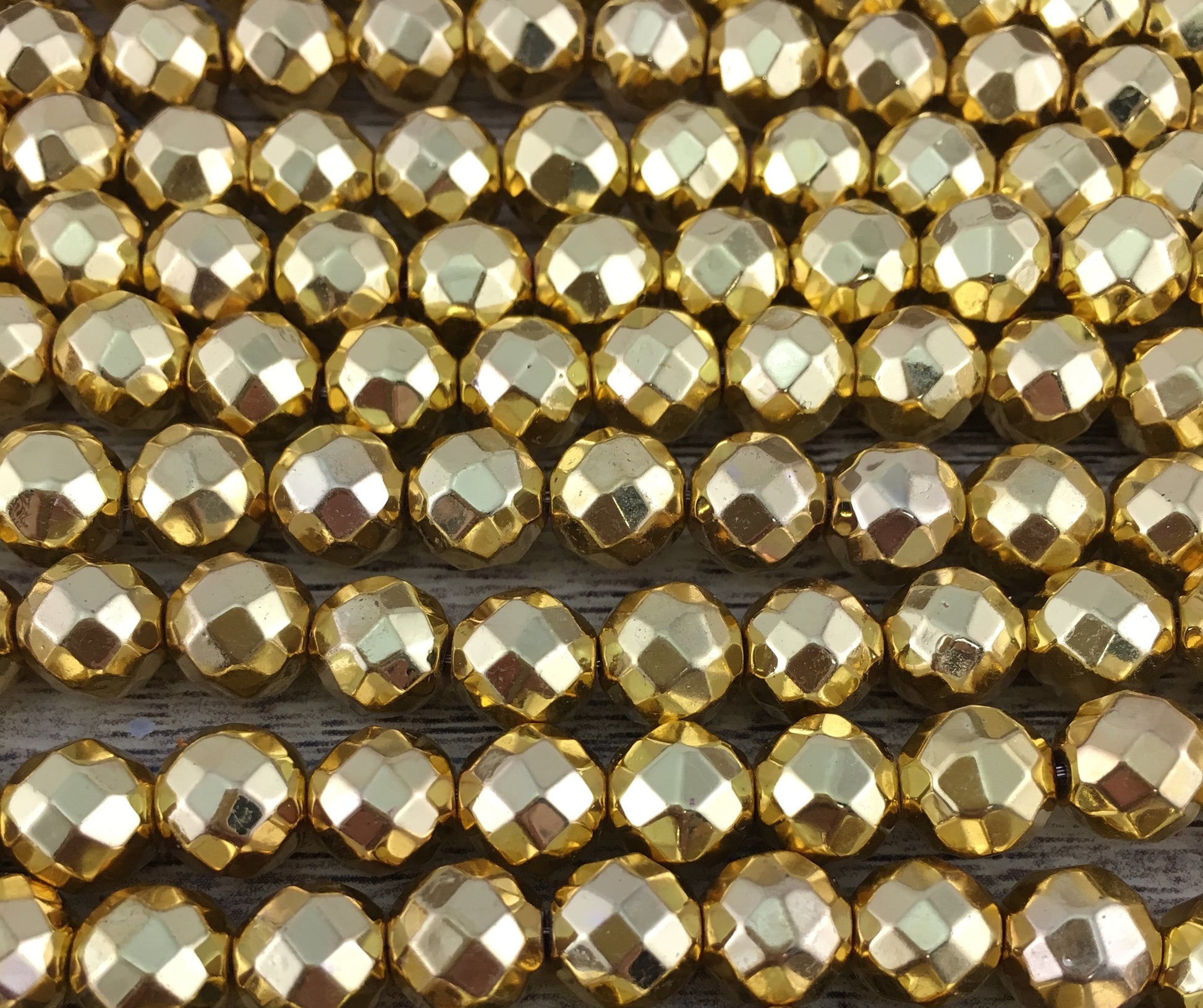 6mm Gold Faceted Hematite Bead | Bellaire Wholesale