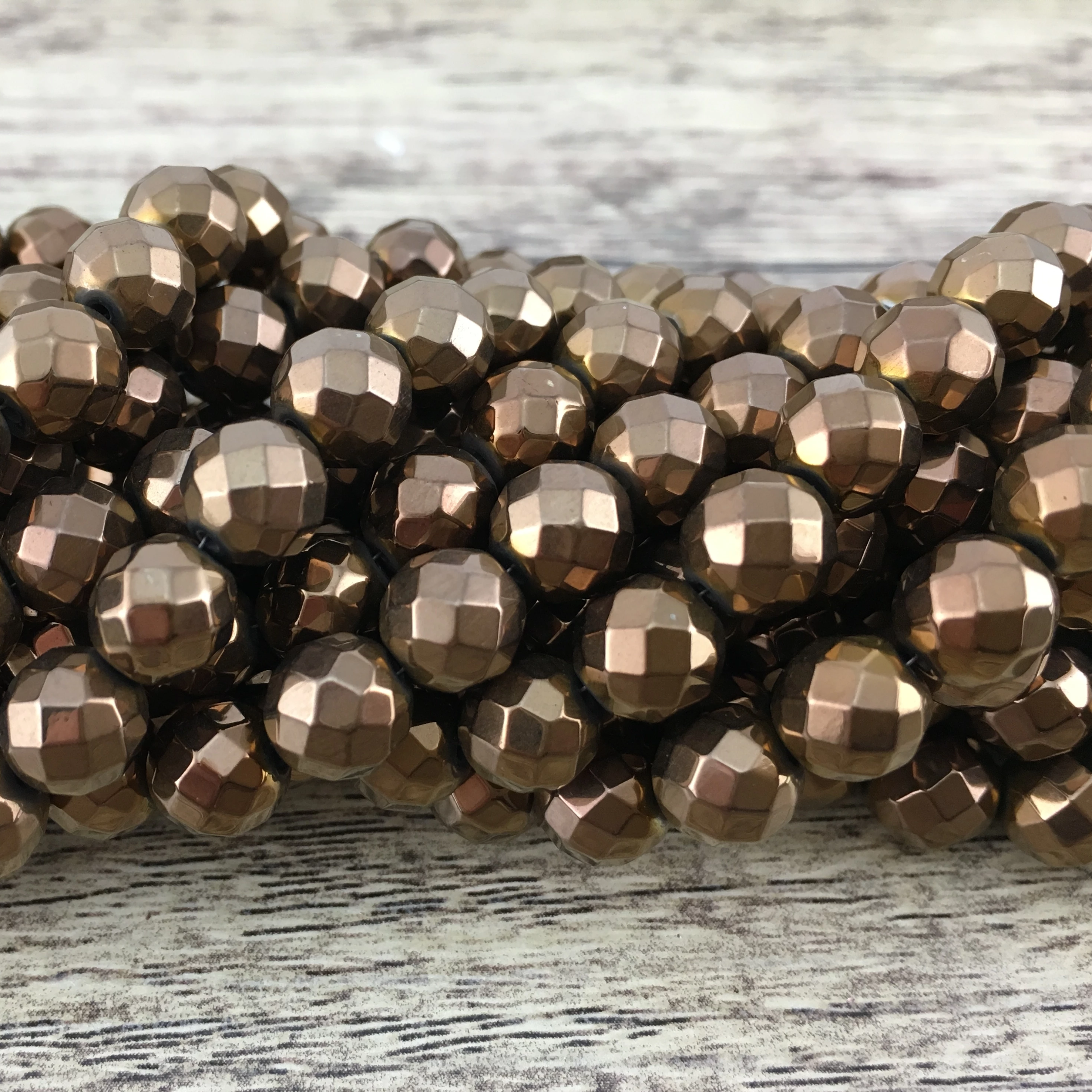 6mm Bronze Faceted Hematite Bead | Bellaire Wholesale