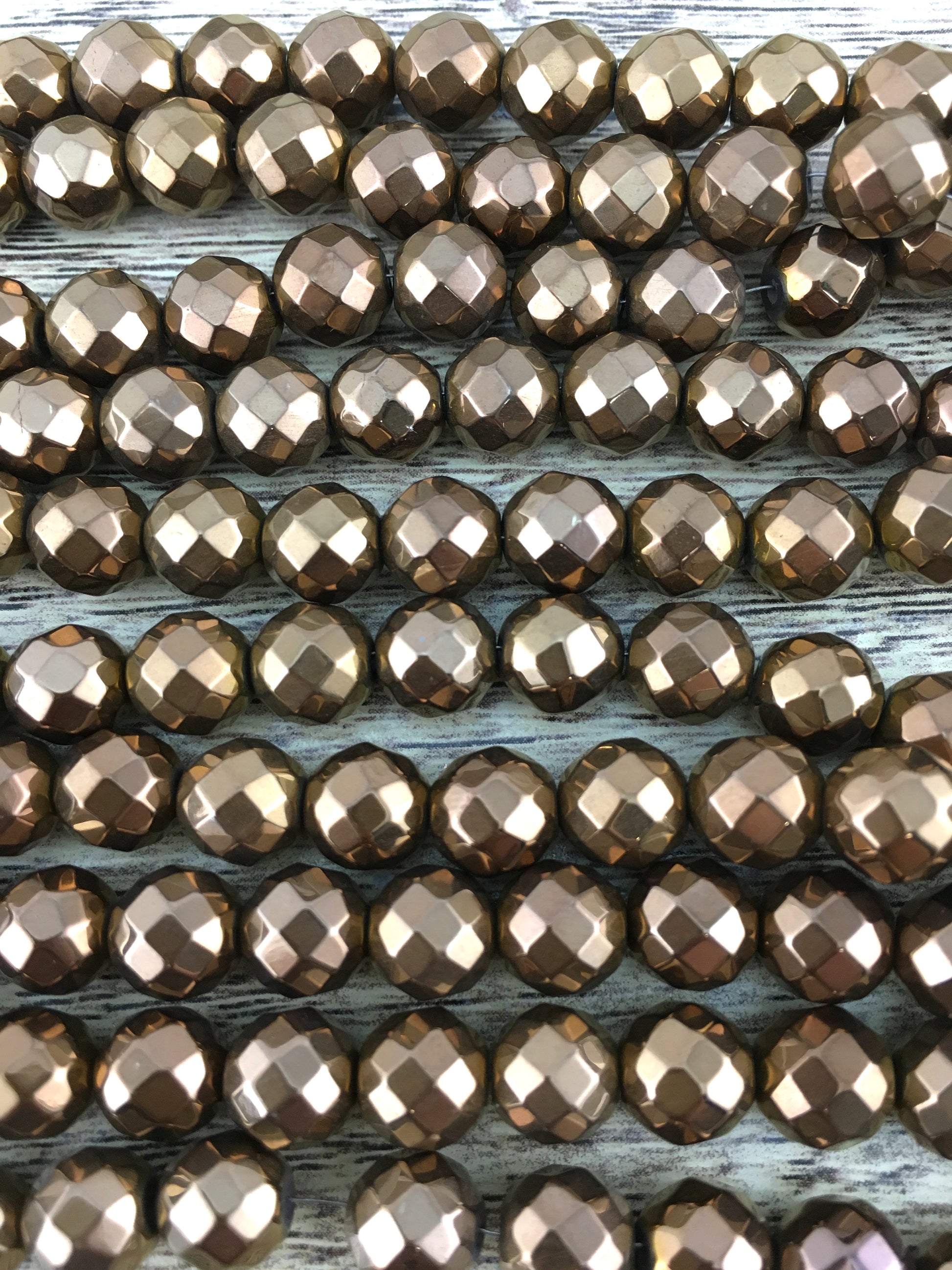 6mm Bronze Faceted Hematite Bead | Bellaire Wholesale