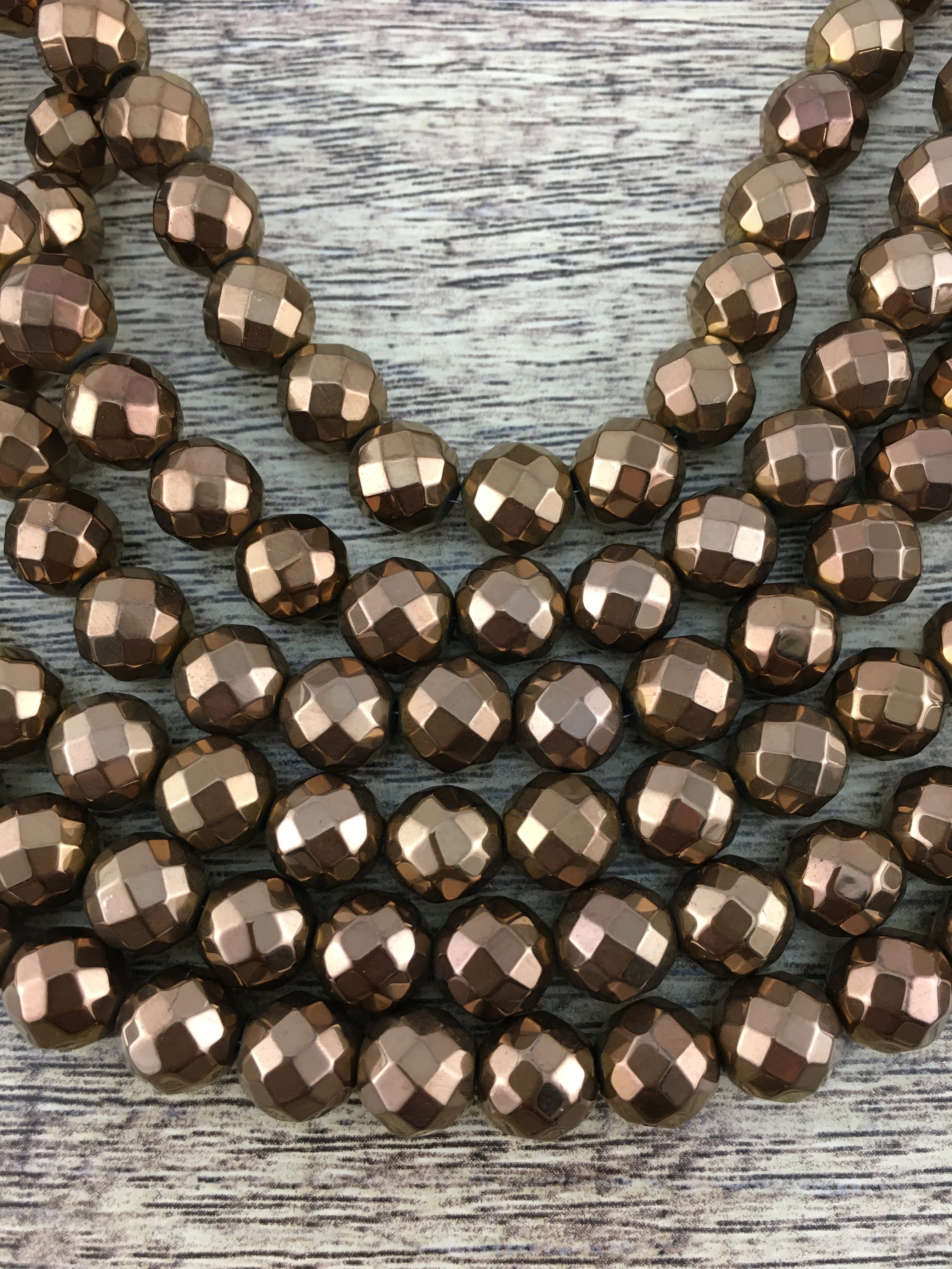 4mm Bronze Faceted Hematite Bead | Bellaire Wholesale