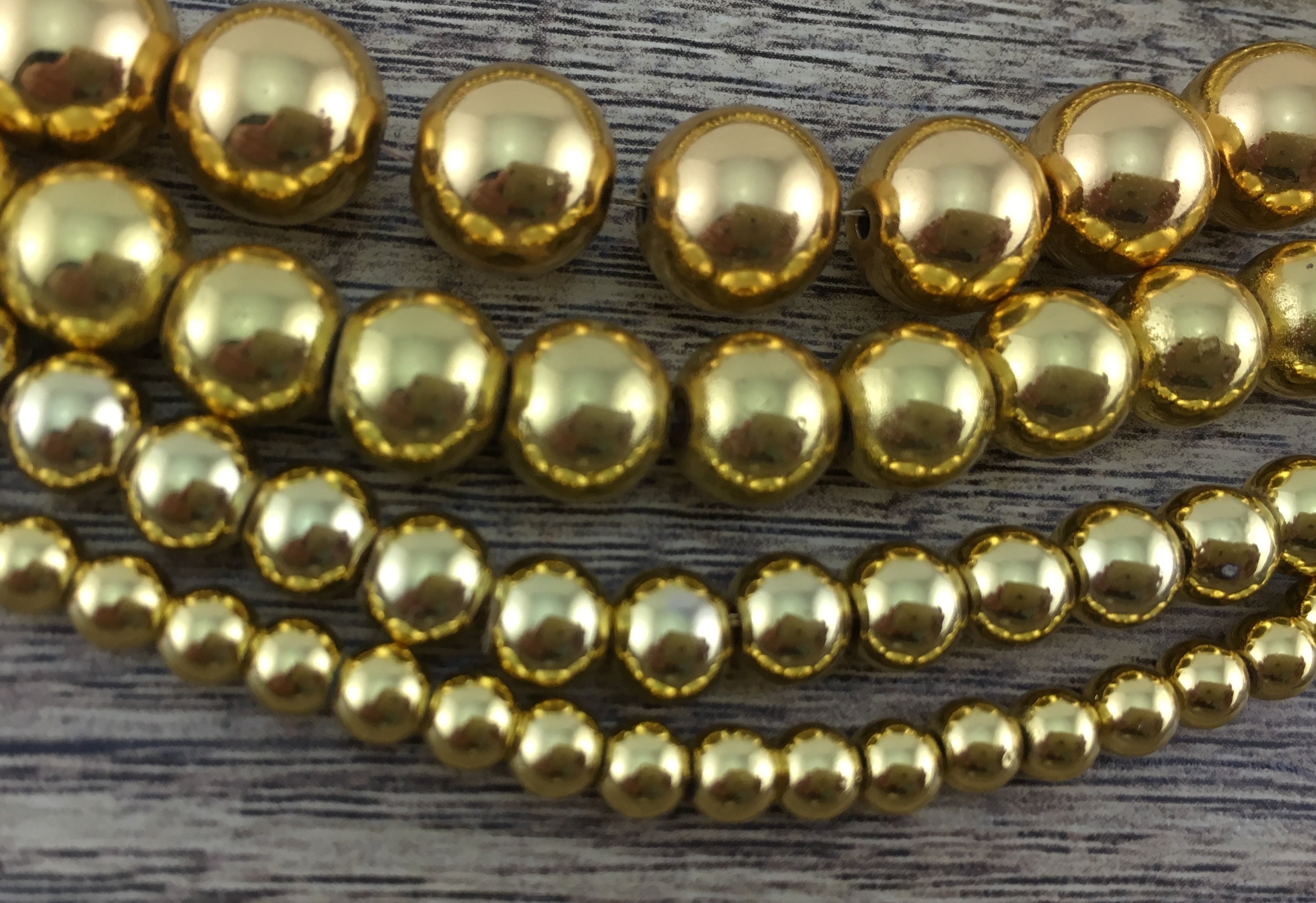 12mm Gold Hematite Bead | Bellaire Wholesale