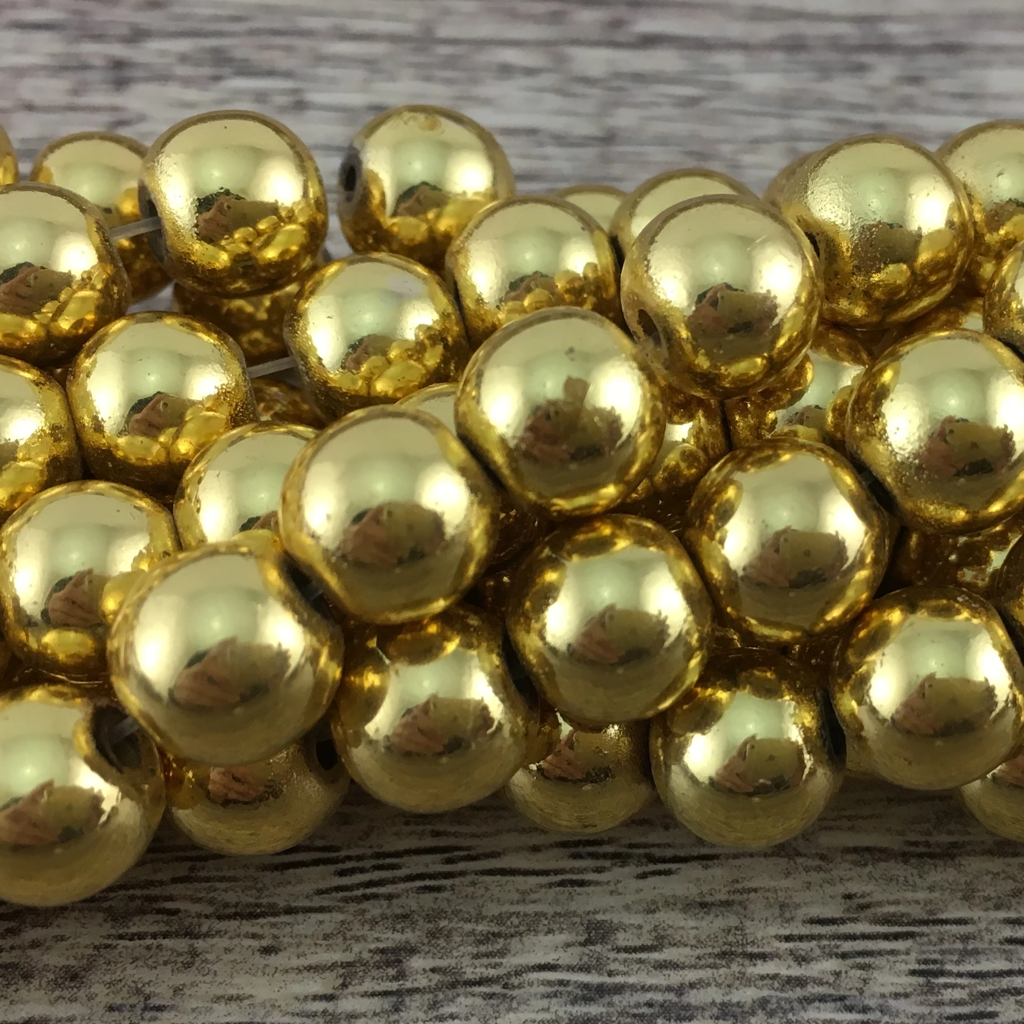 6mm Gold Hematite Bead | Bellaire Wholesale