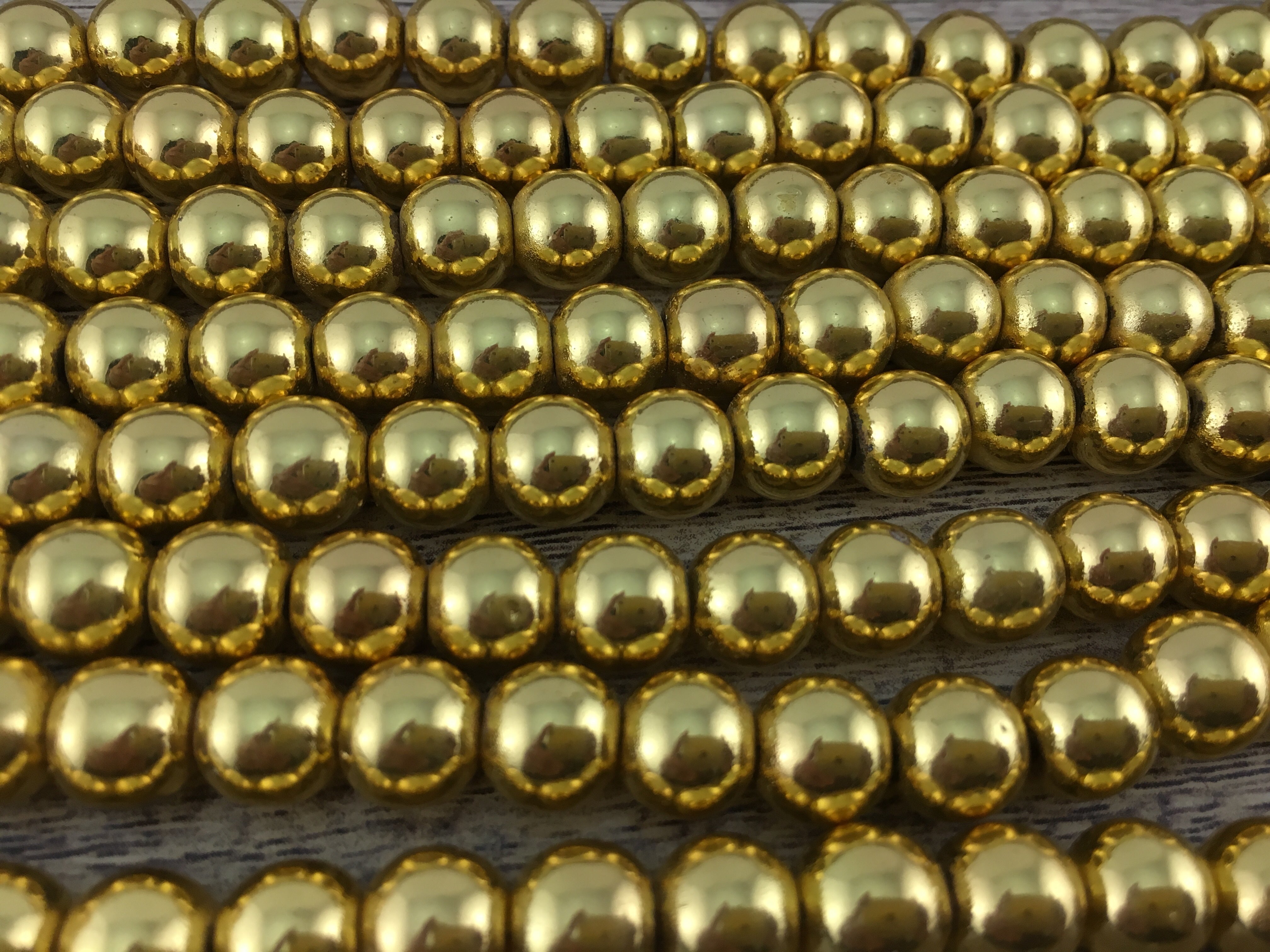 4mm Gold Hematite Bead | Bellaire Wholesale