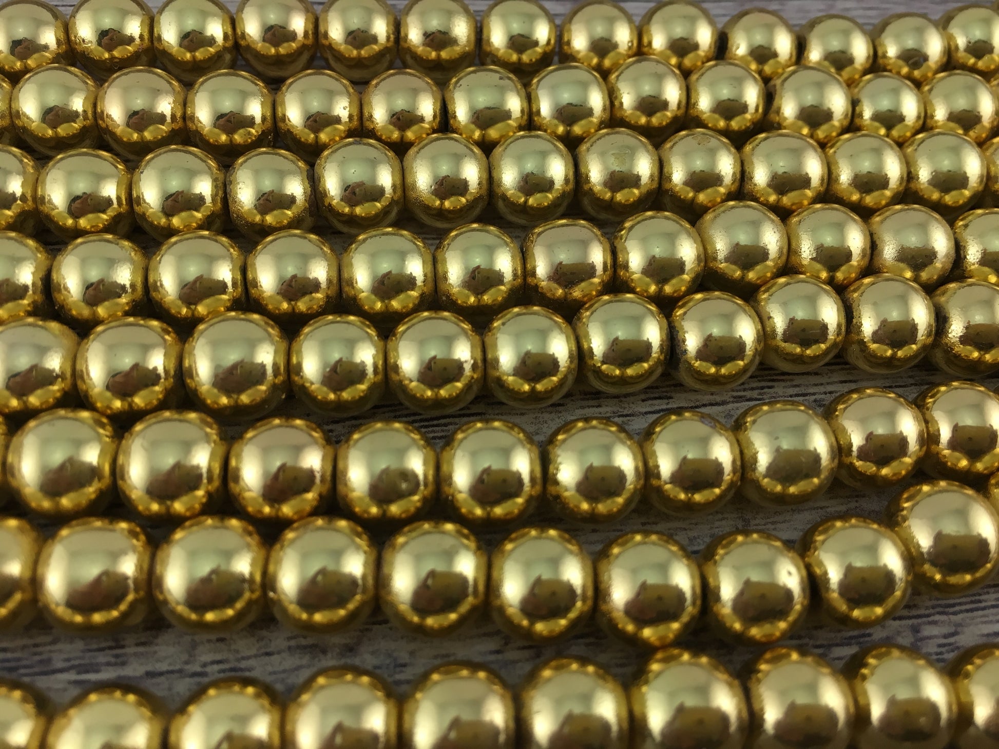 12mm Gold Hematite Bead | Bellaire Wholesale