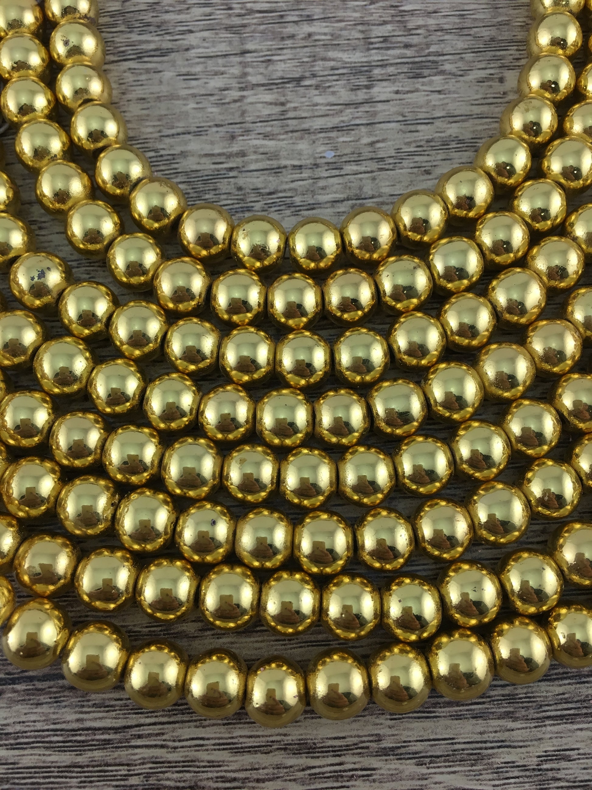 10mm Gold Hematite Bead | Bellaire Wholesale