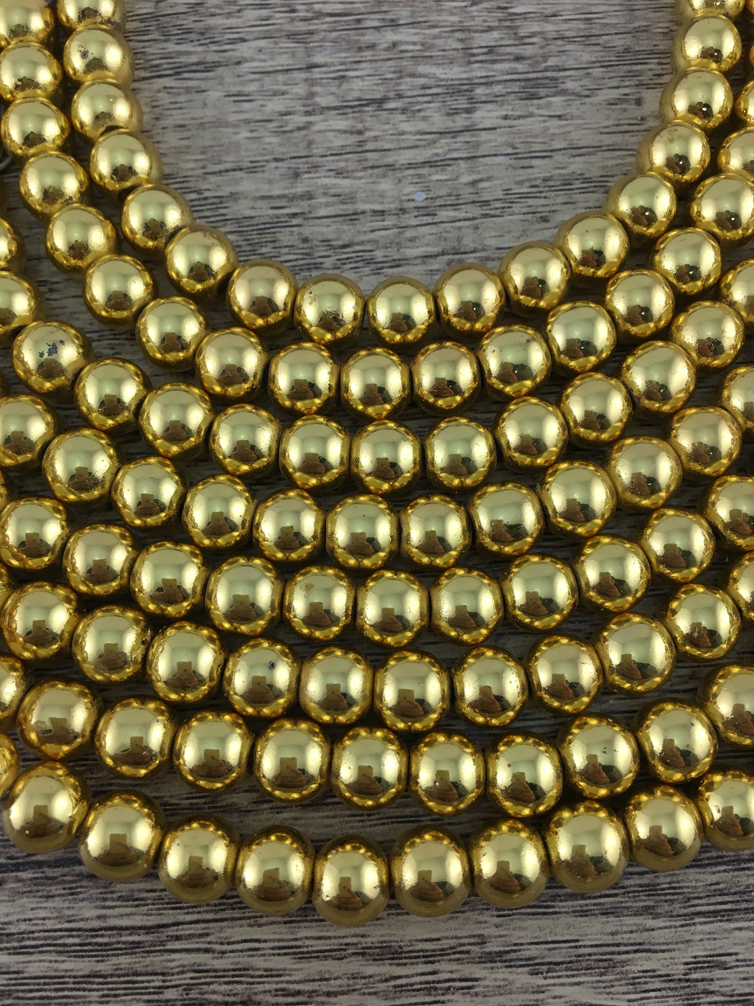 12mm Gold Hematite Bead | Bellaire Wholesale
