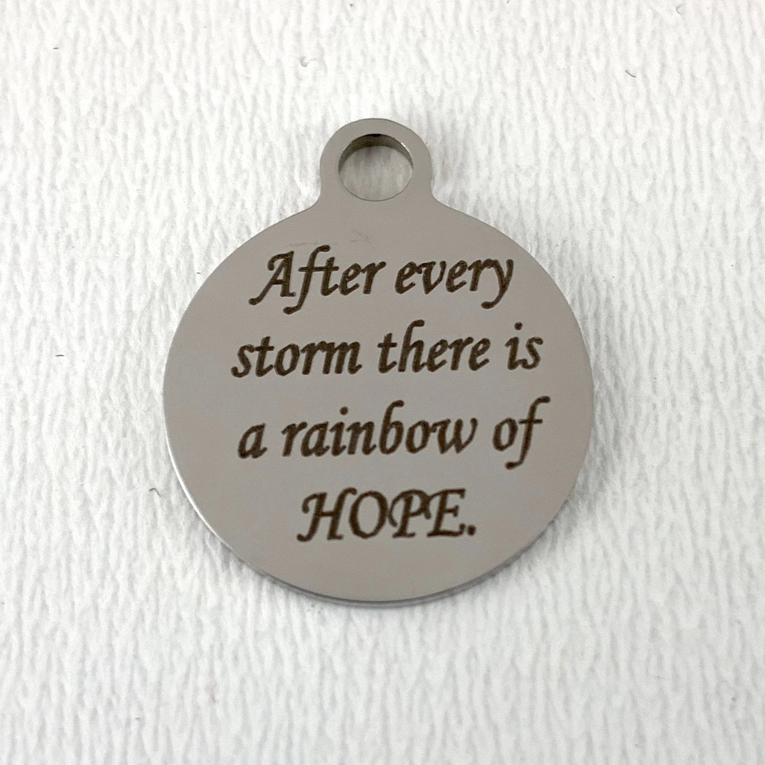 After every storm there is... Engraved Charm | Bellaire Wholesale