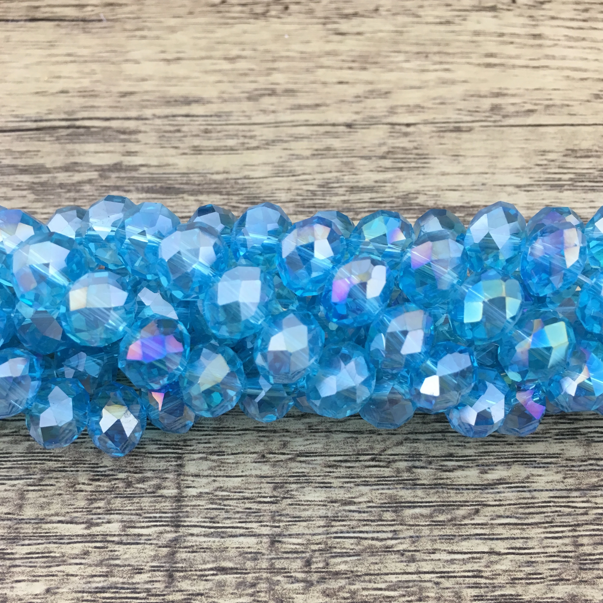 8mm Faceted Rondelle Light Blue AB Glass Bead | Bellaire Wholesale