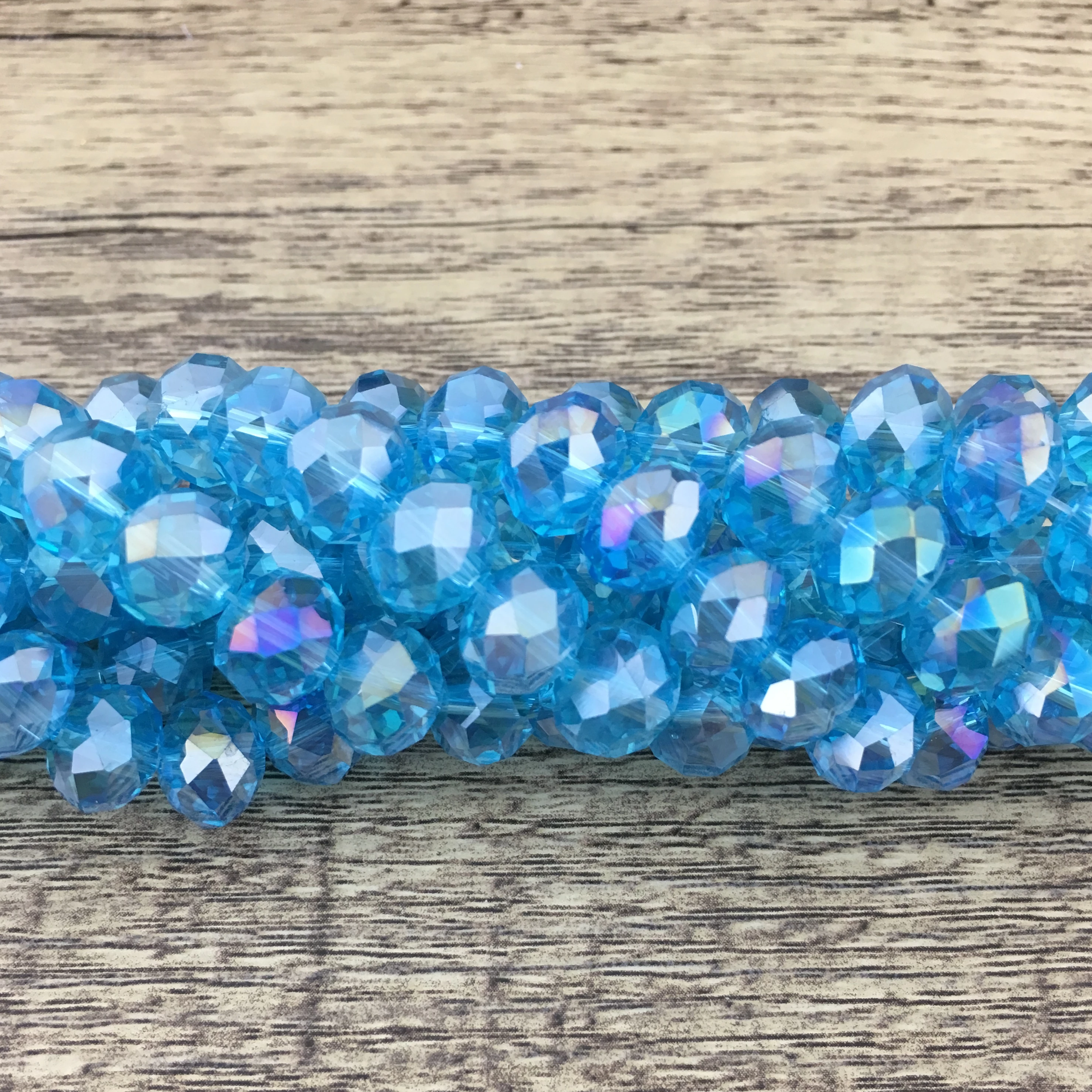 8mm Faceted Rondelle Light Blue AB Glass Bead | Bellaire Wholesale