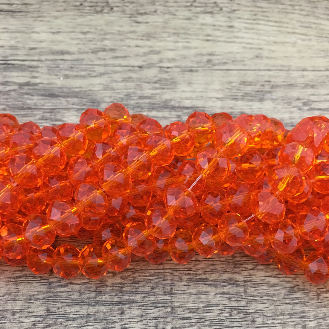 10mm Faceted Rondelle Orange Glass Bead | Bellaire Wholesale