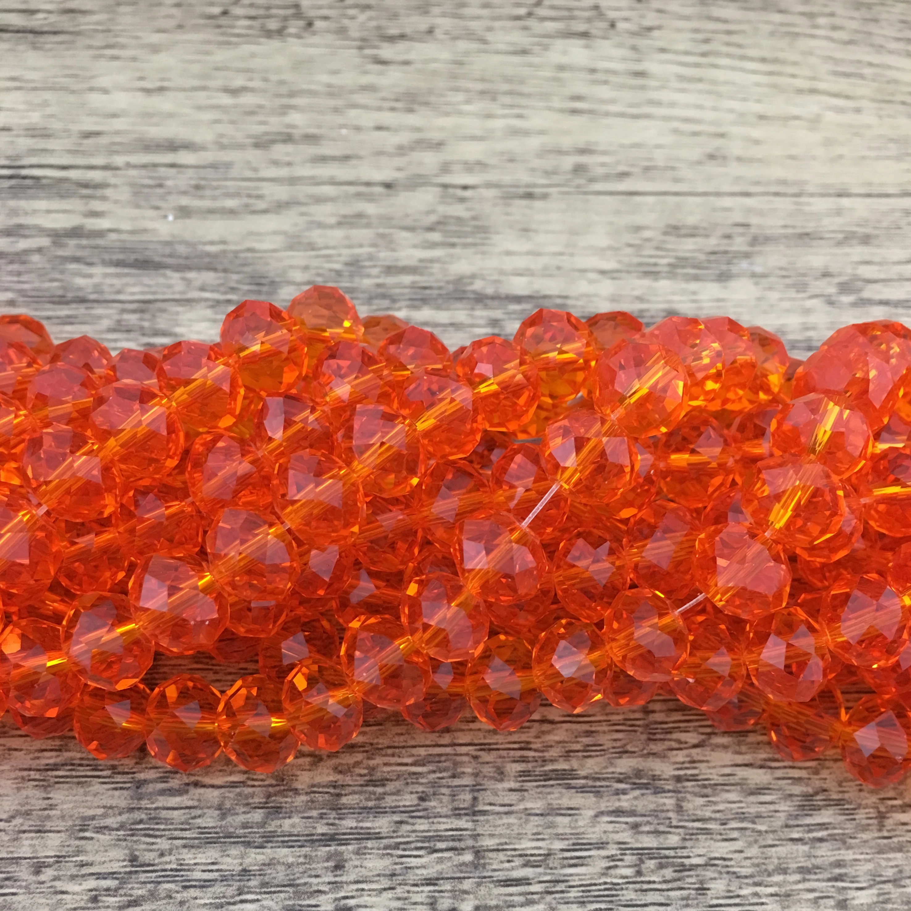 10mm Faceted Rondelle Orange Glass Bead | Bellaire Wholesale