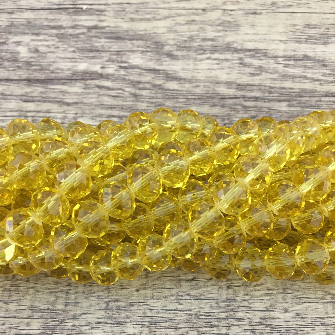 10mm Faceted Rondelle Peridot Green Glass Bead | Bellaire Wholesale