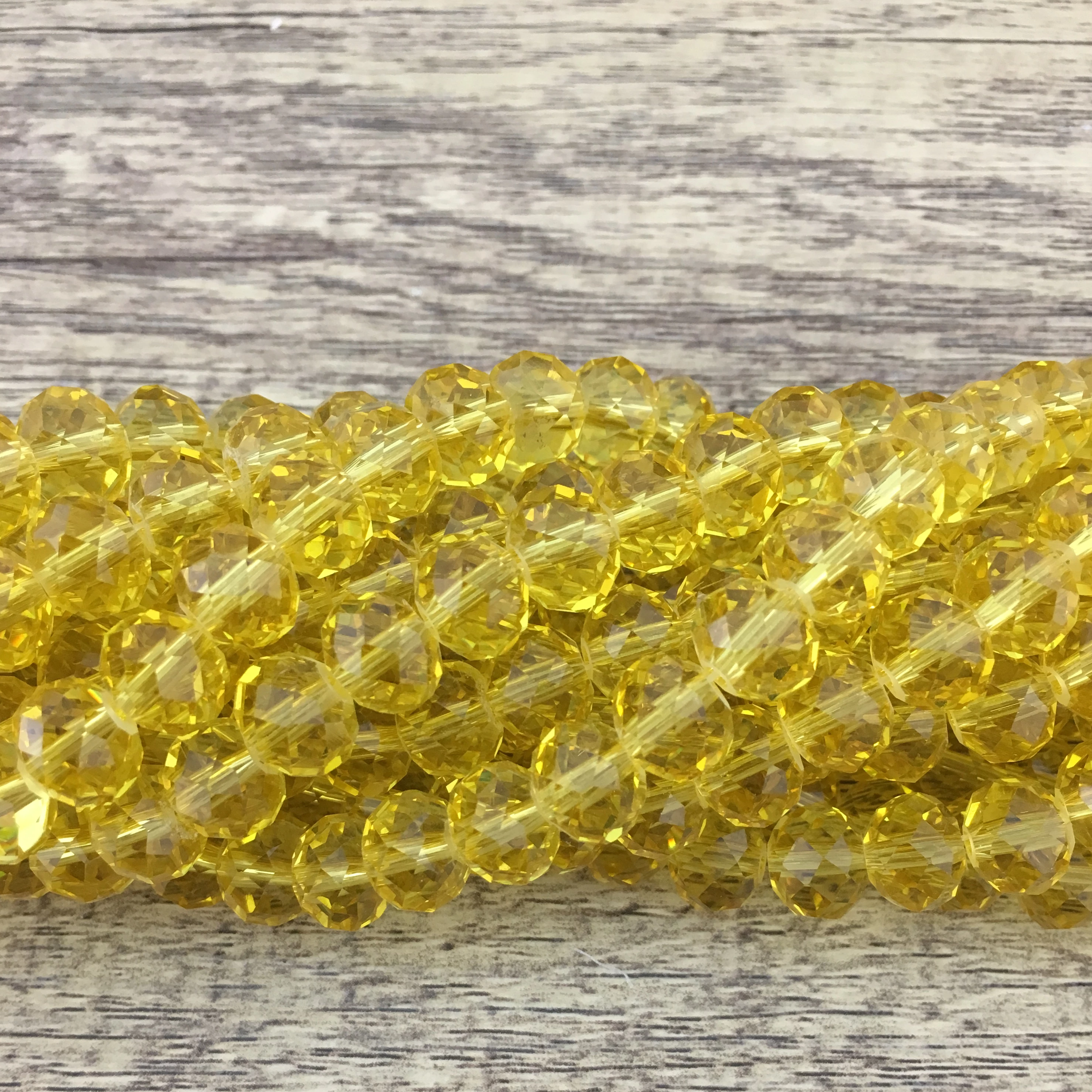 10mm Faceted Rondelle Peridot Green Glass Bead | Bellaire Wholesale