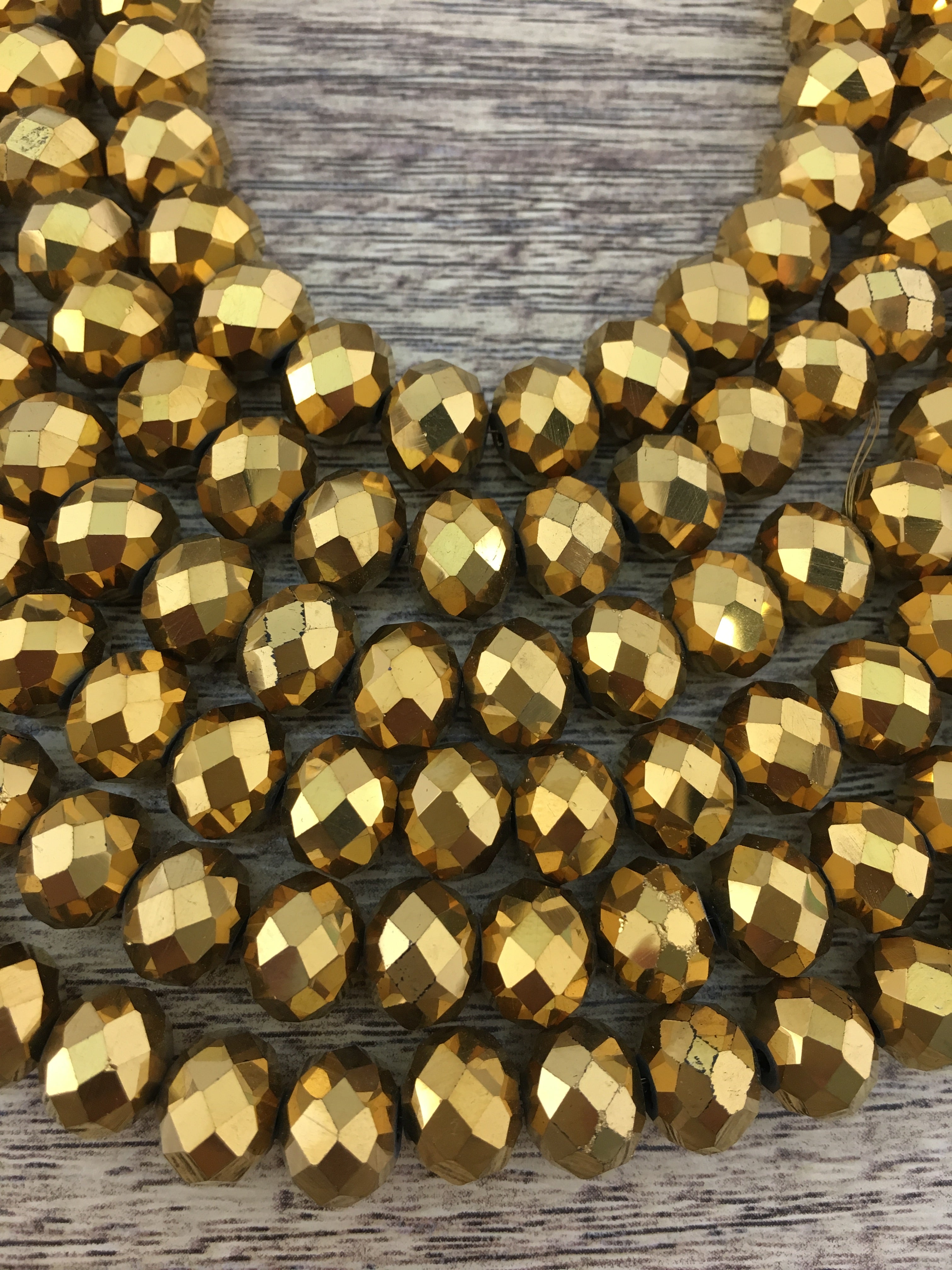 6mm Faceted Rondelle Metallic Gold Glass Bead | Bellaire Wholesale