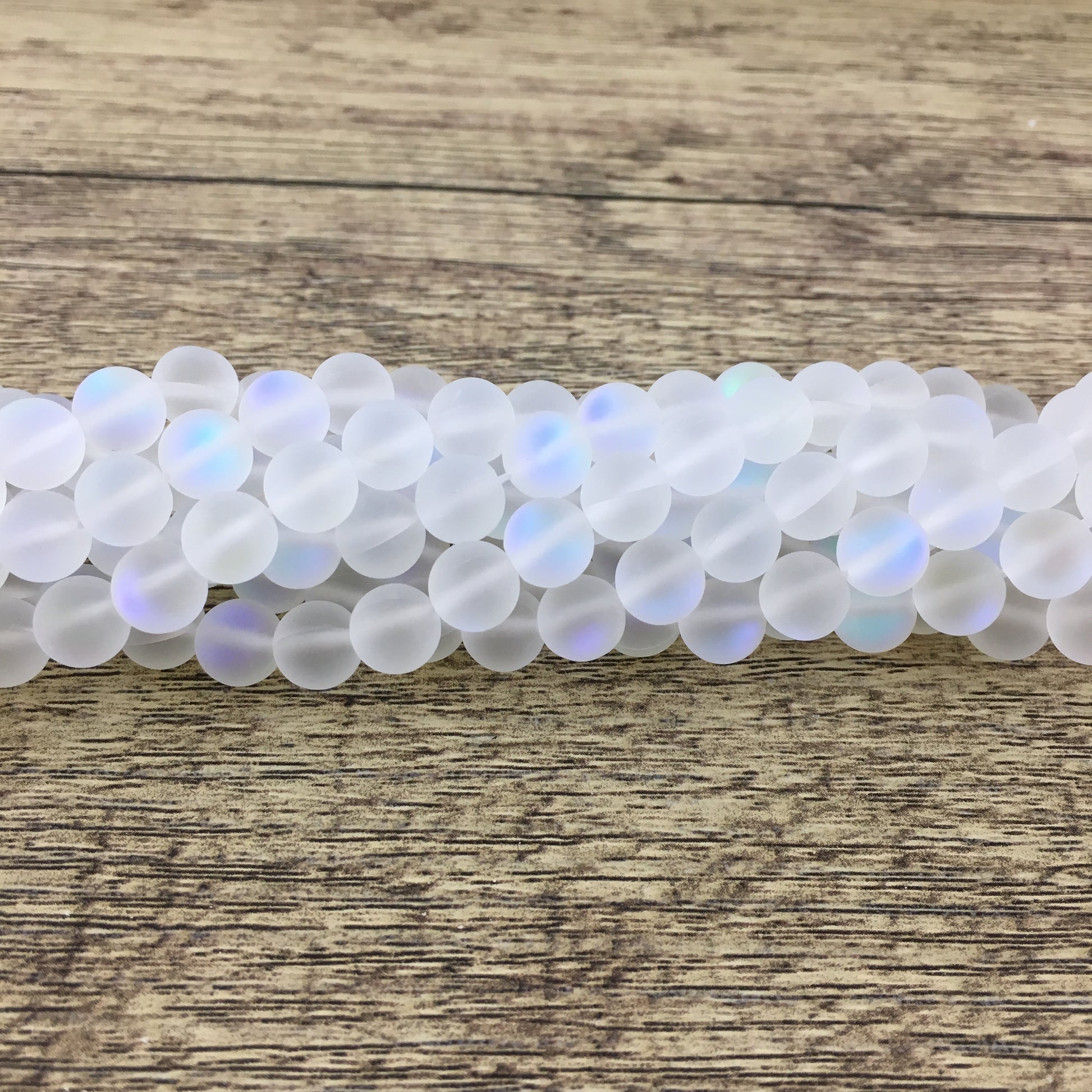 6mm Frosted Clear Mystic Aura Beads | Bellaire Wholesale