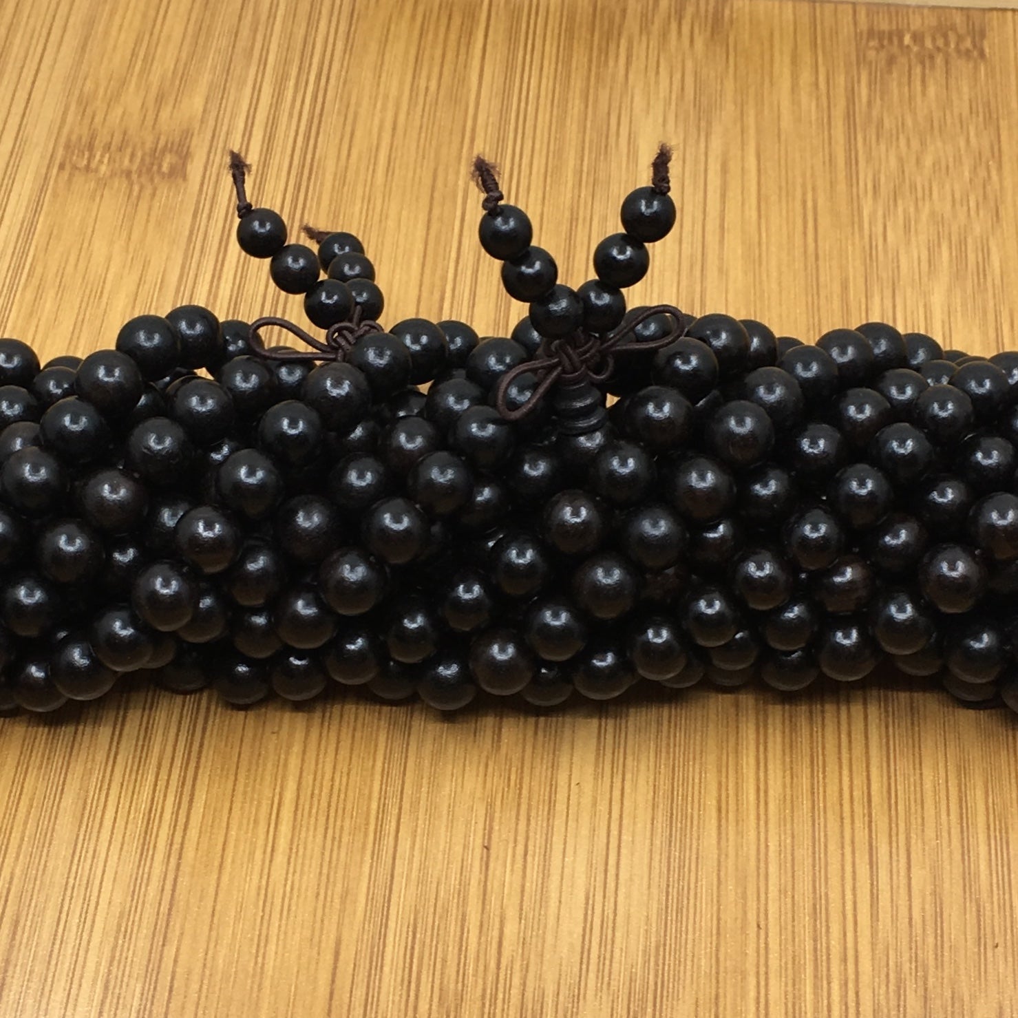 8mm Black Wood Bead with Guru Bead | Bellaire Wholesale