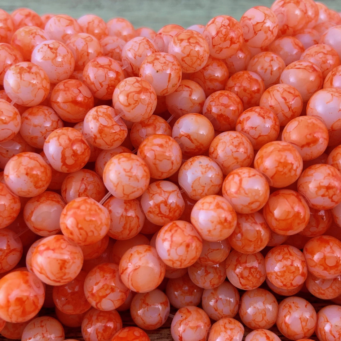 8mm Marble Orange Faux Glass Pearl | Bellaire Wholesale