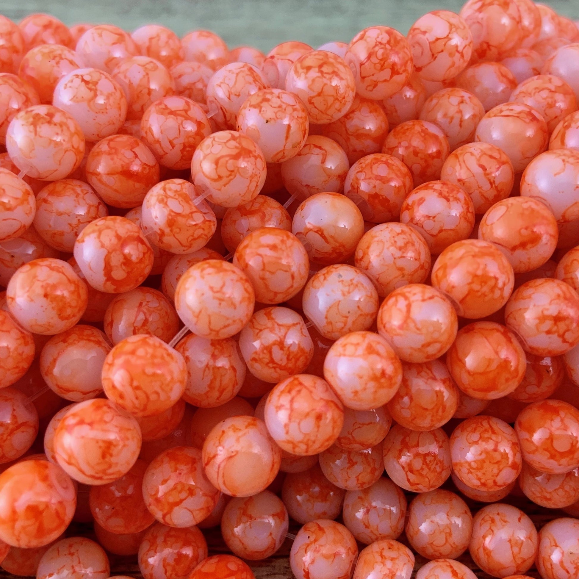 8mm Marble Orange Faux Glass Pearl | Bellaire Wholesale