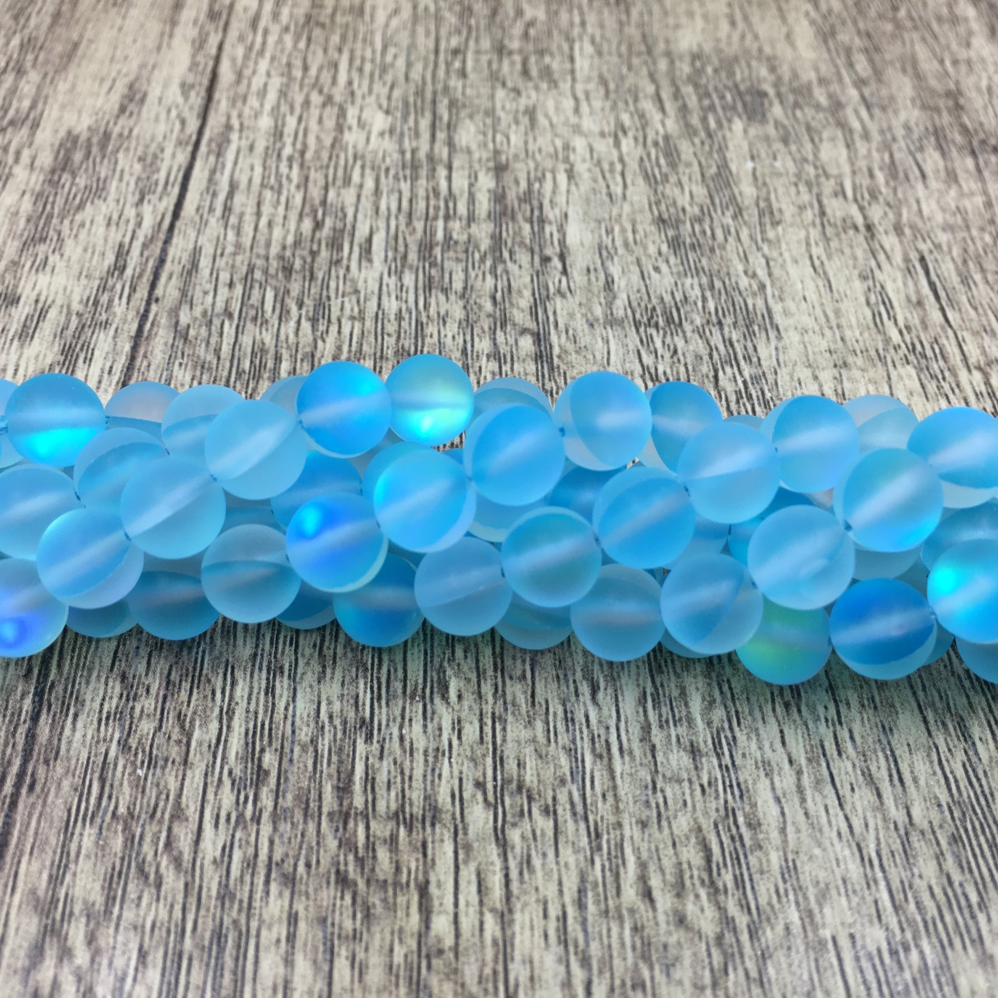 6mm Frosted Aqua Blue Mystic Aura Bead | Bellaire Wholesale