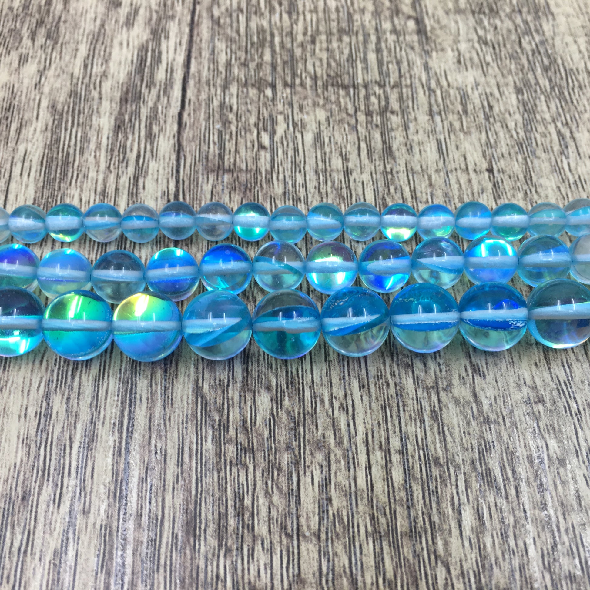 8mm Aqua Blue Mystic Aura Bead | Bellaire Wholesale
