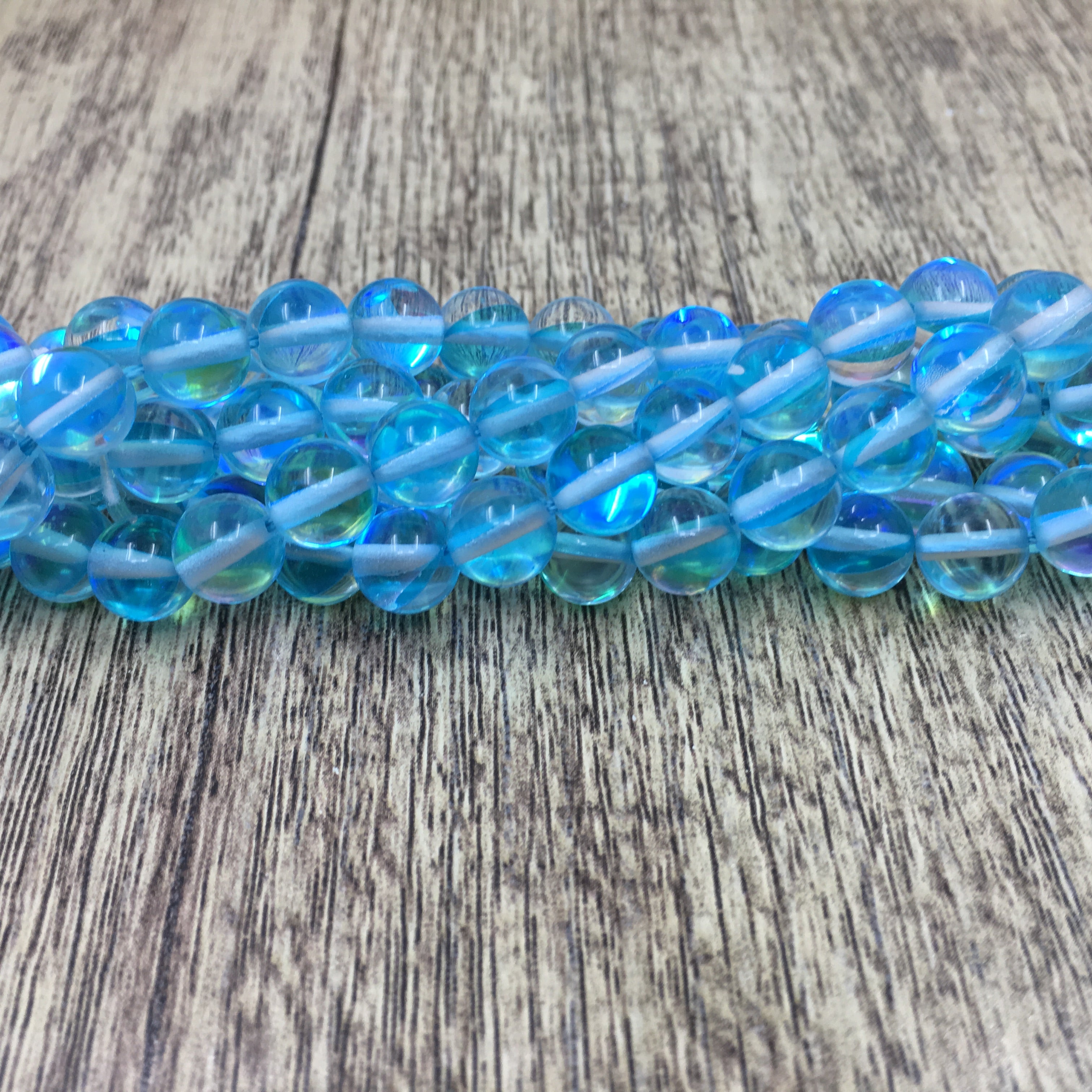 6mm Aqua Blue Mystic Aura Bead | Bellaire Wholesale