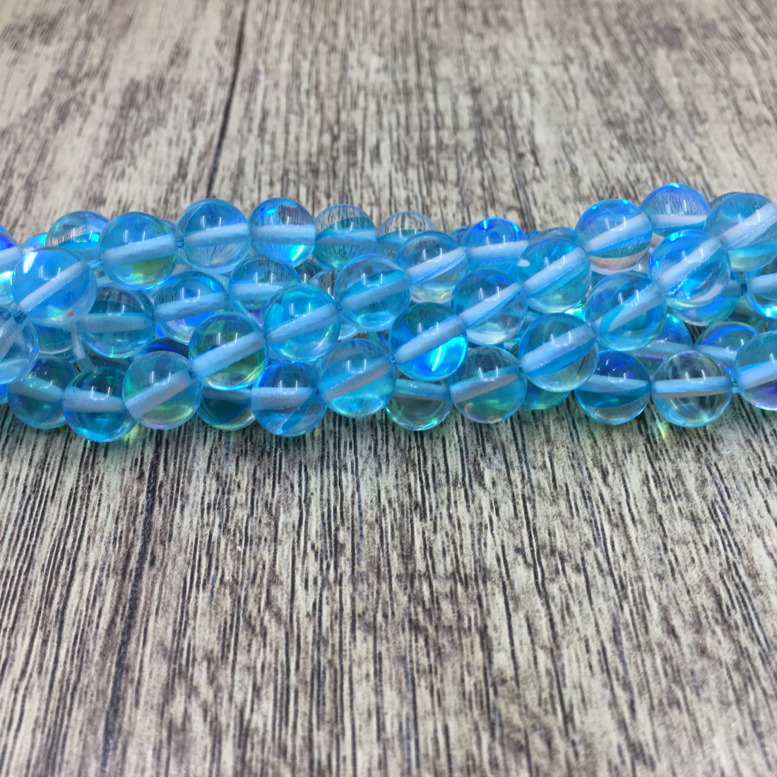 8mm Aqua Blue Mystic Aura Bead | Bellaire Wholesale