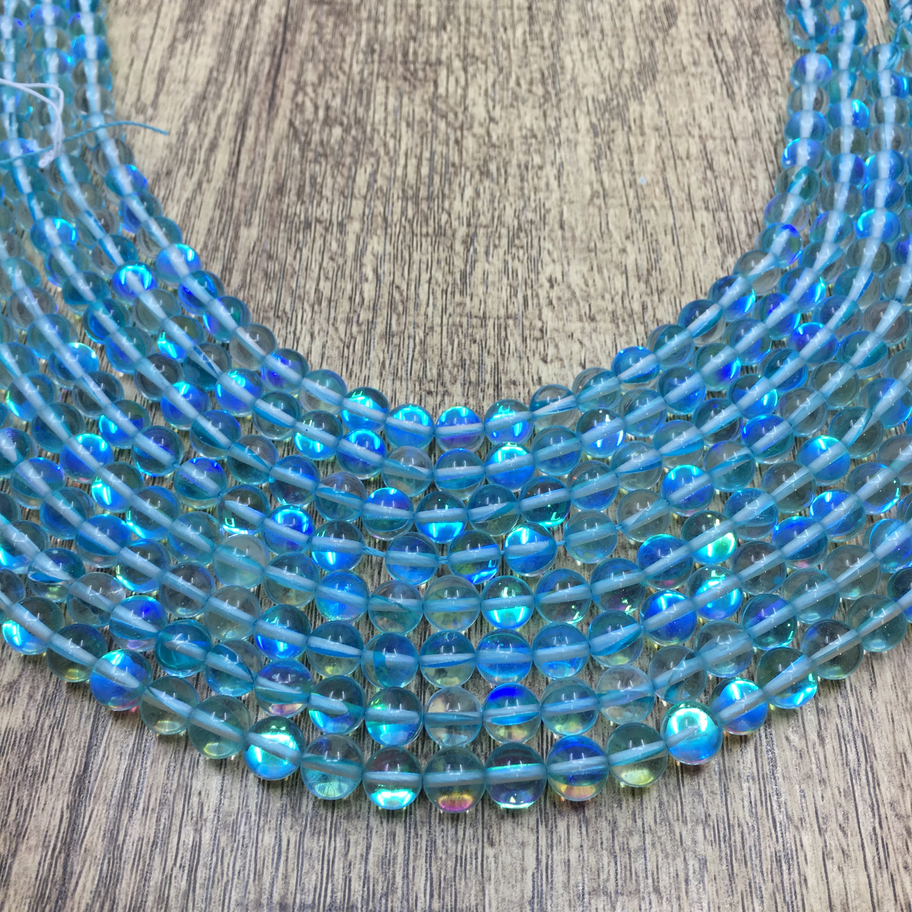 10mm Aqua Blue Mystic Aura Bead | Bellaire Wholesale