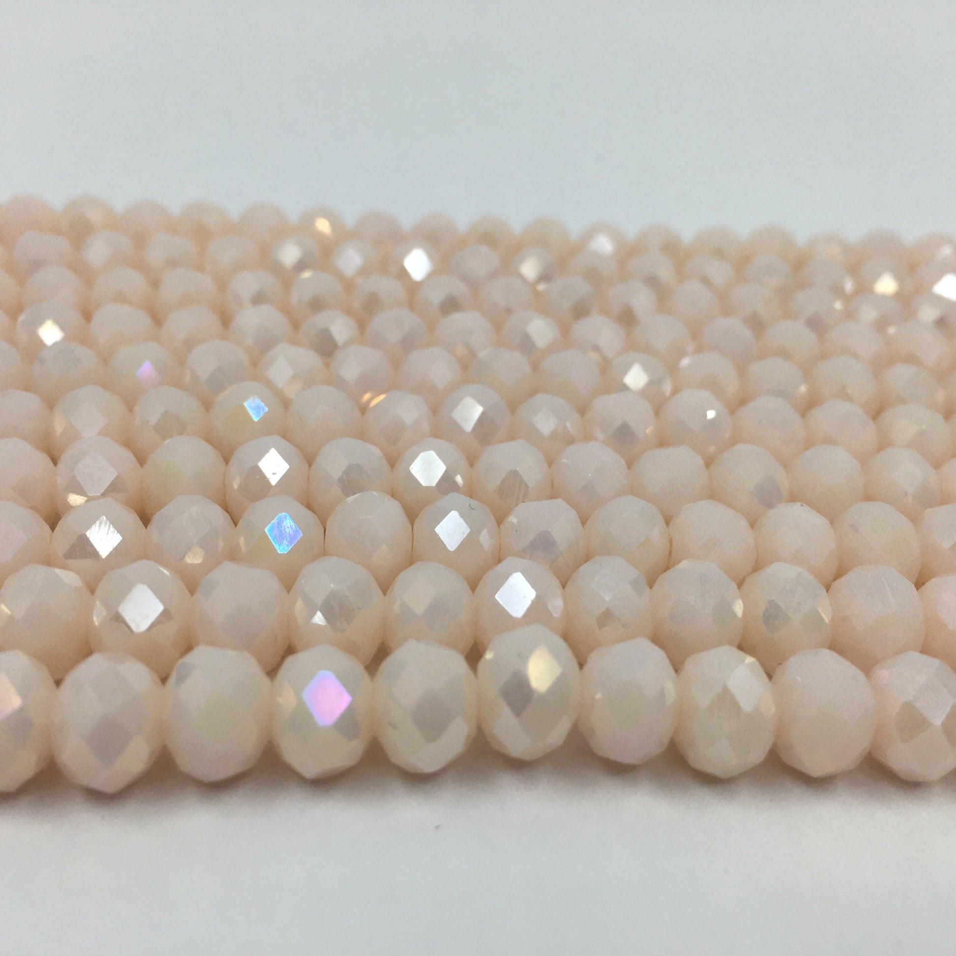 6mm Faceted Rondelle Glass Bead, Bone AB Color | Bellaire Wholesale