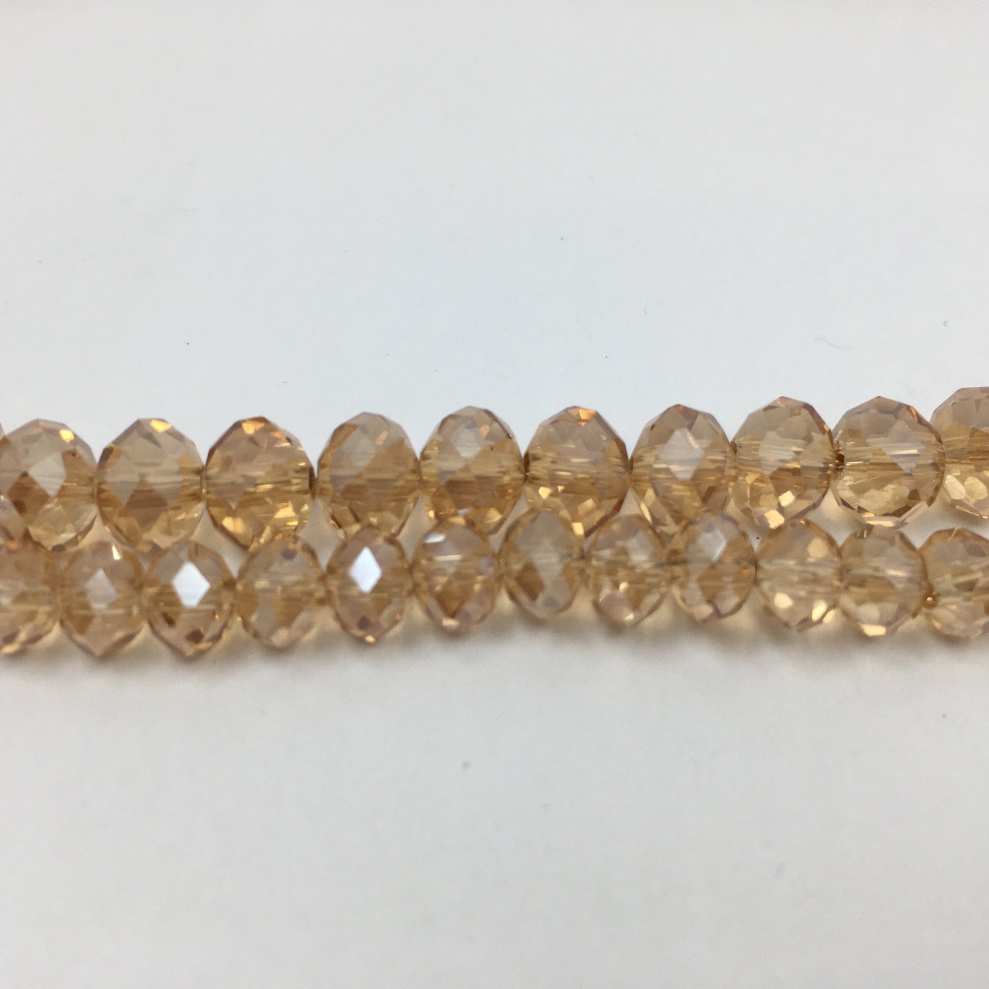 8mm Faceted Rondelle Golden Shadow Glass Bead | Bellaire Wholesale
