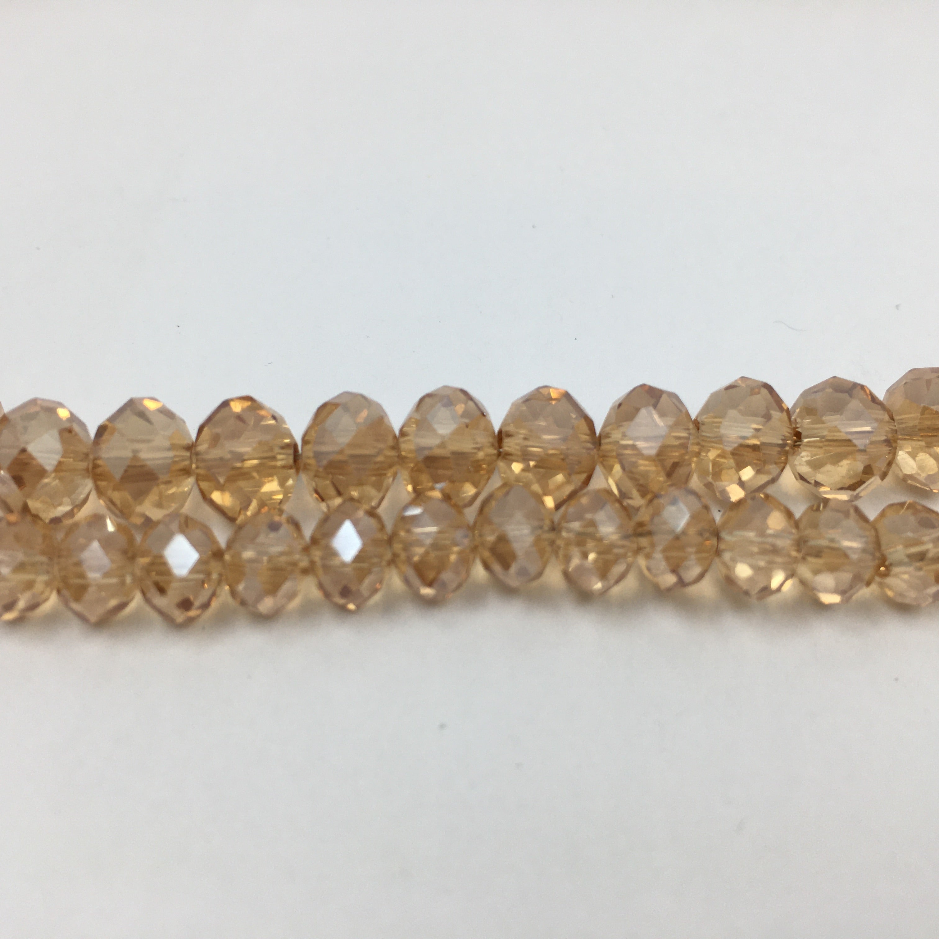 8mm Faceted Rondelle Golden Shadow Glass Bead | Bellaire Wholesale