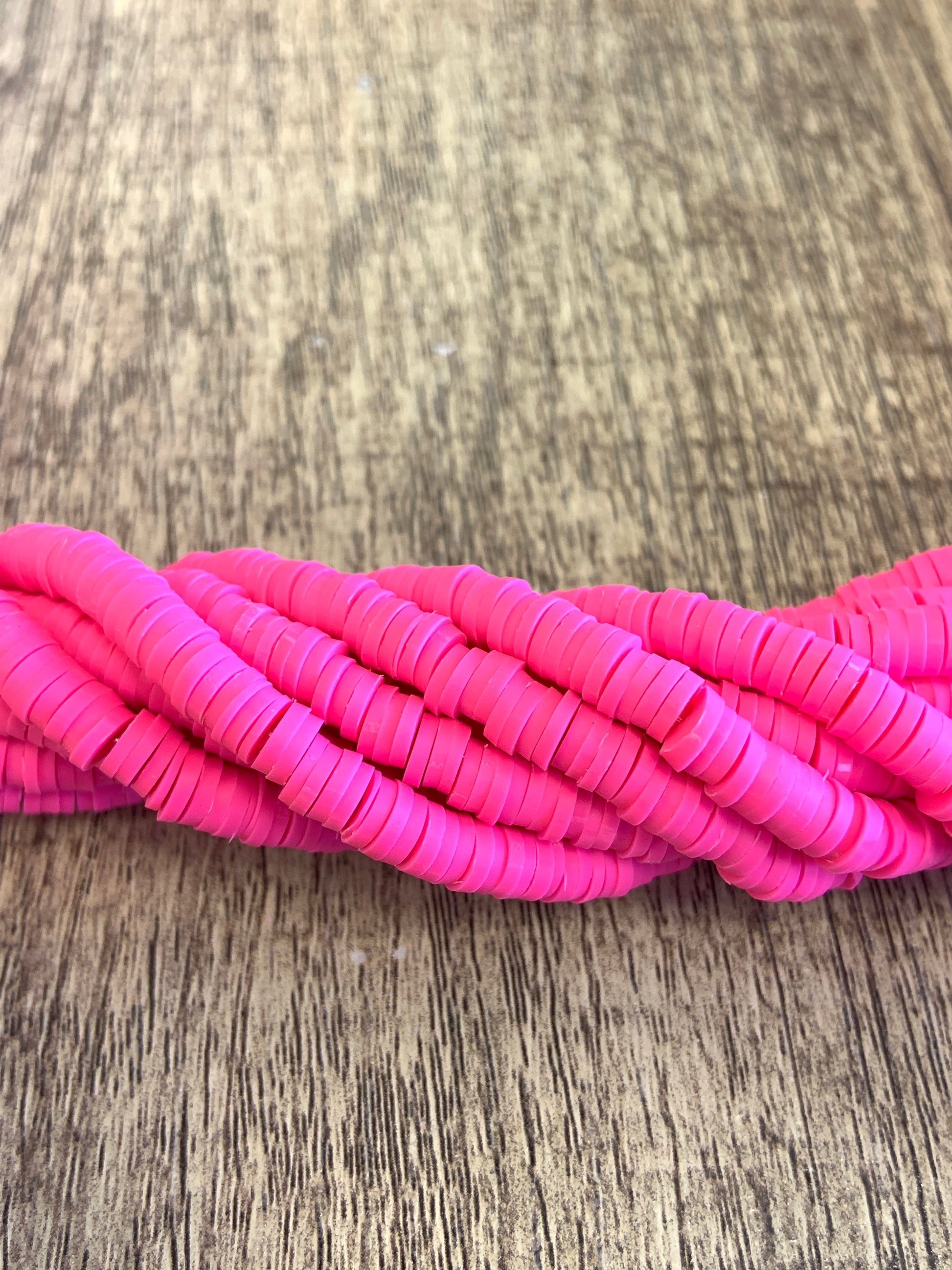 6mm Fluorescent Pink Heishi Beads | Bellaire Wholesale