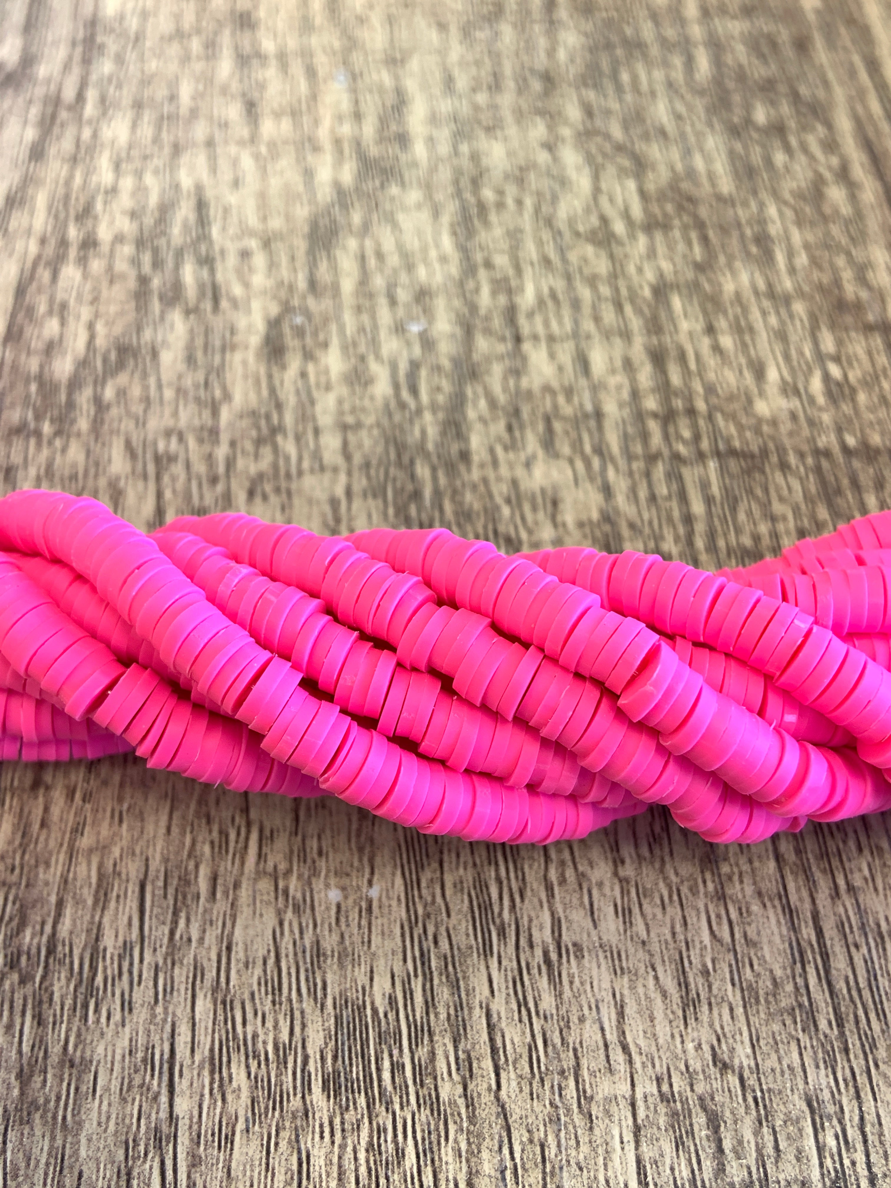 6mm Fluorescent Pink Heishi Beads | Bellaire Wholesale
