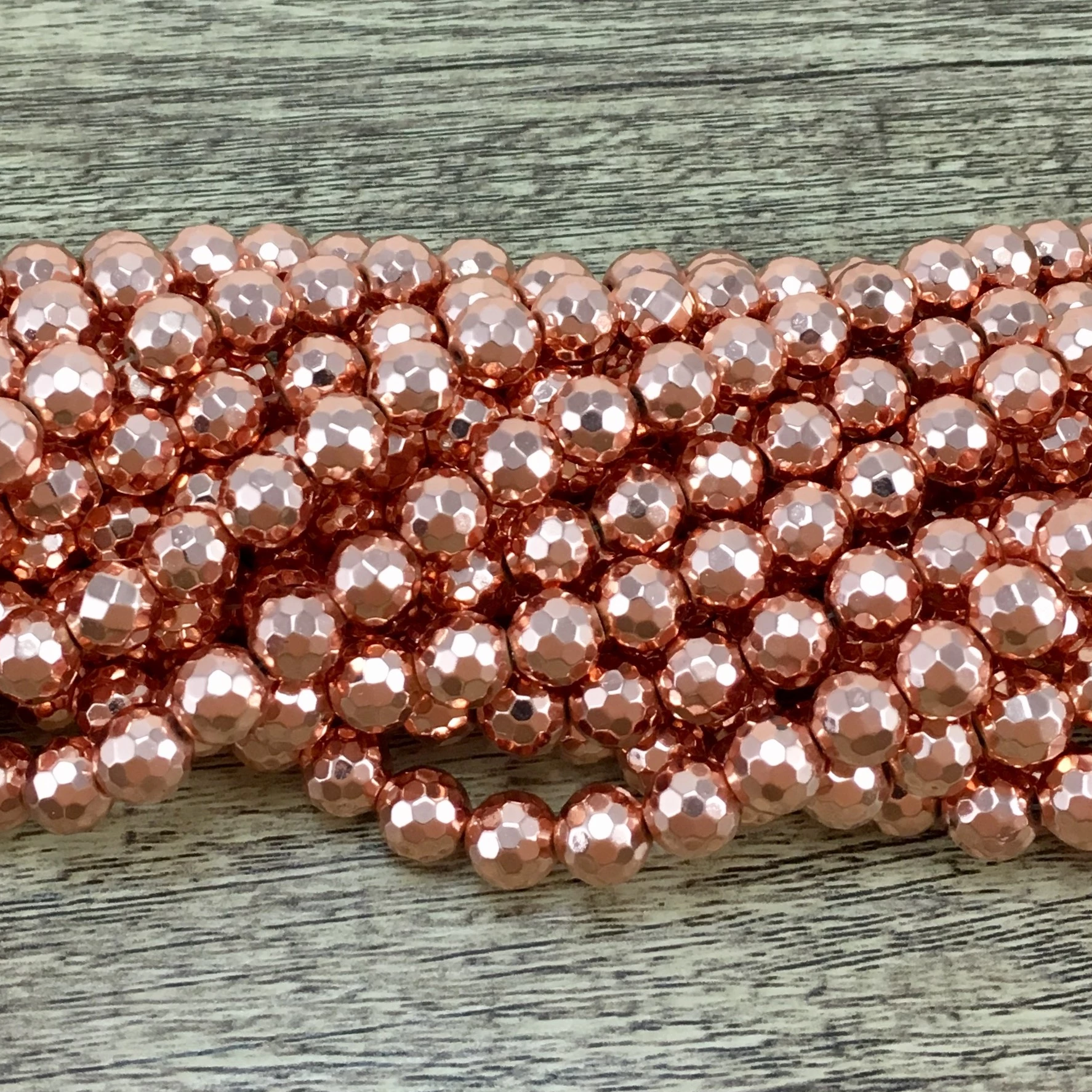 12mm Rose Gold Faceted Hematite Bead | Bellaire Wholesale
