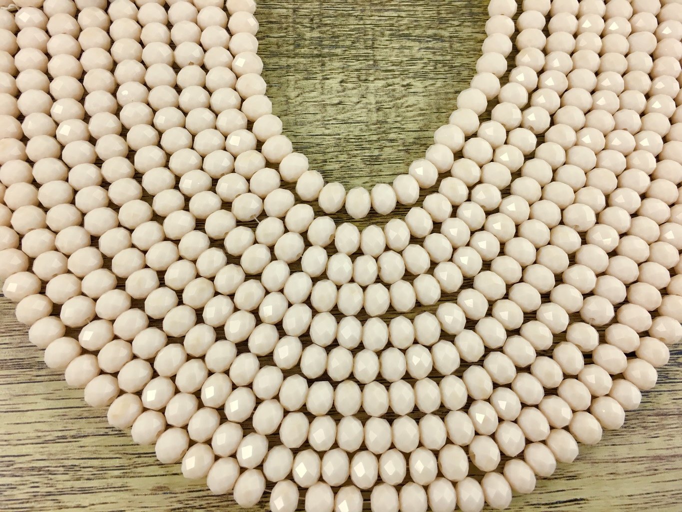6mm Faceted Rondelle Glass Bead, Bone Color | Bellaire Wholesale