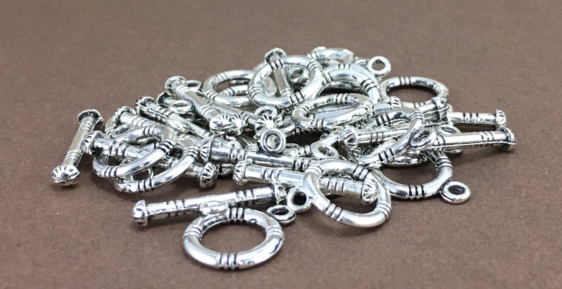 2 Sets of Small round Toggle | Bellaire Wholesale