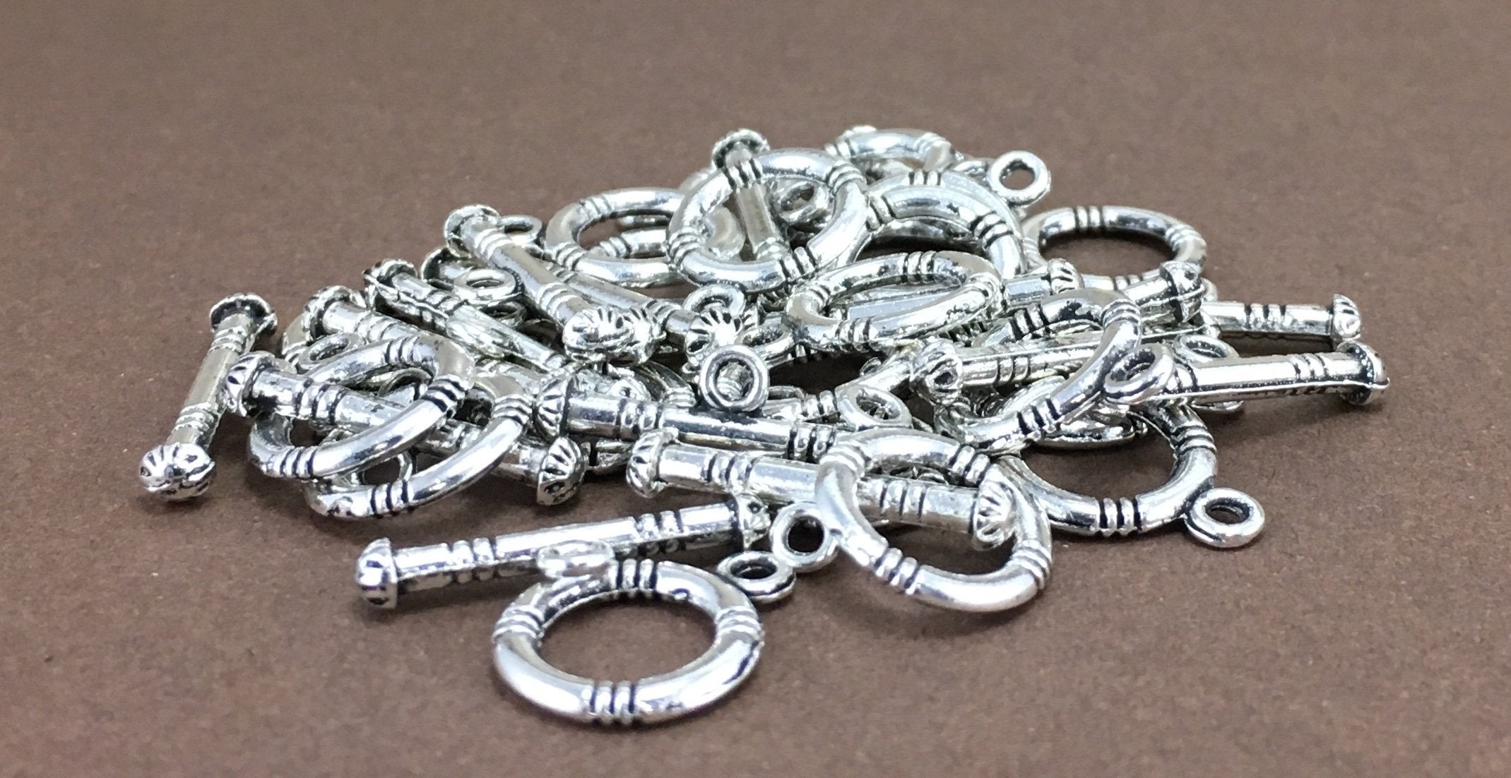 2 Sets of Small round Toggle | Bellaire Wholesale