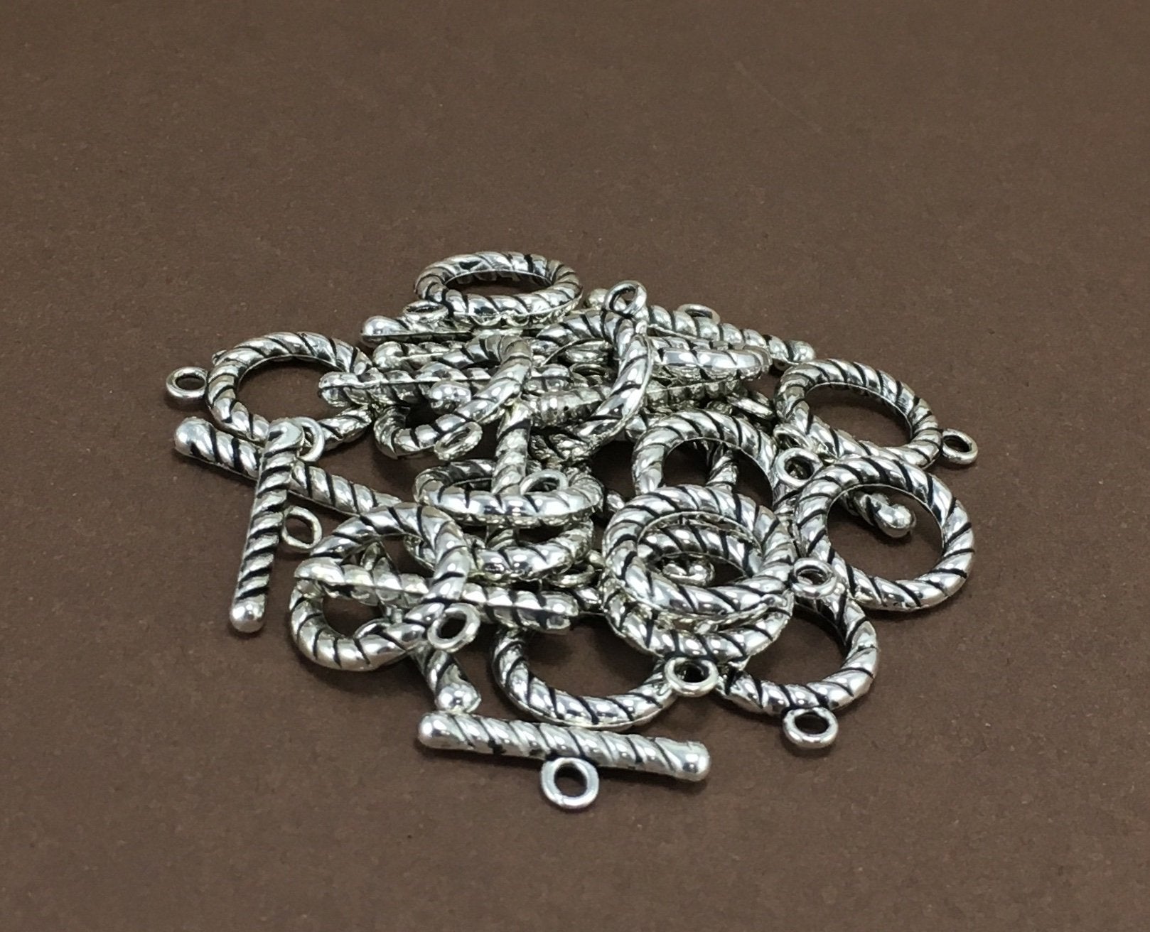 8 Sets of Tibetan Pattern Toggle | Bellaire Wholesale