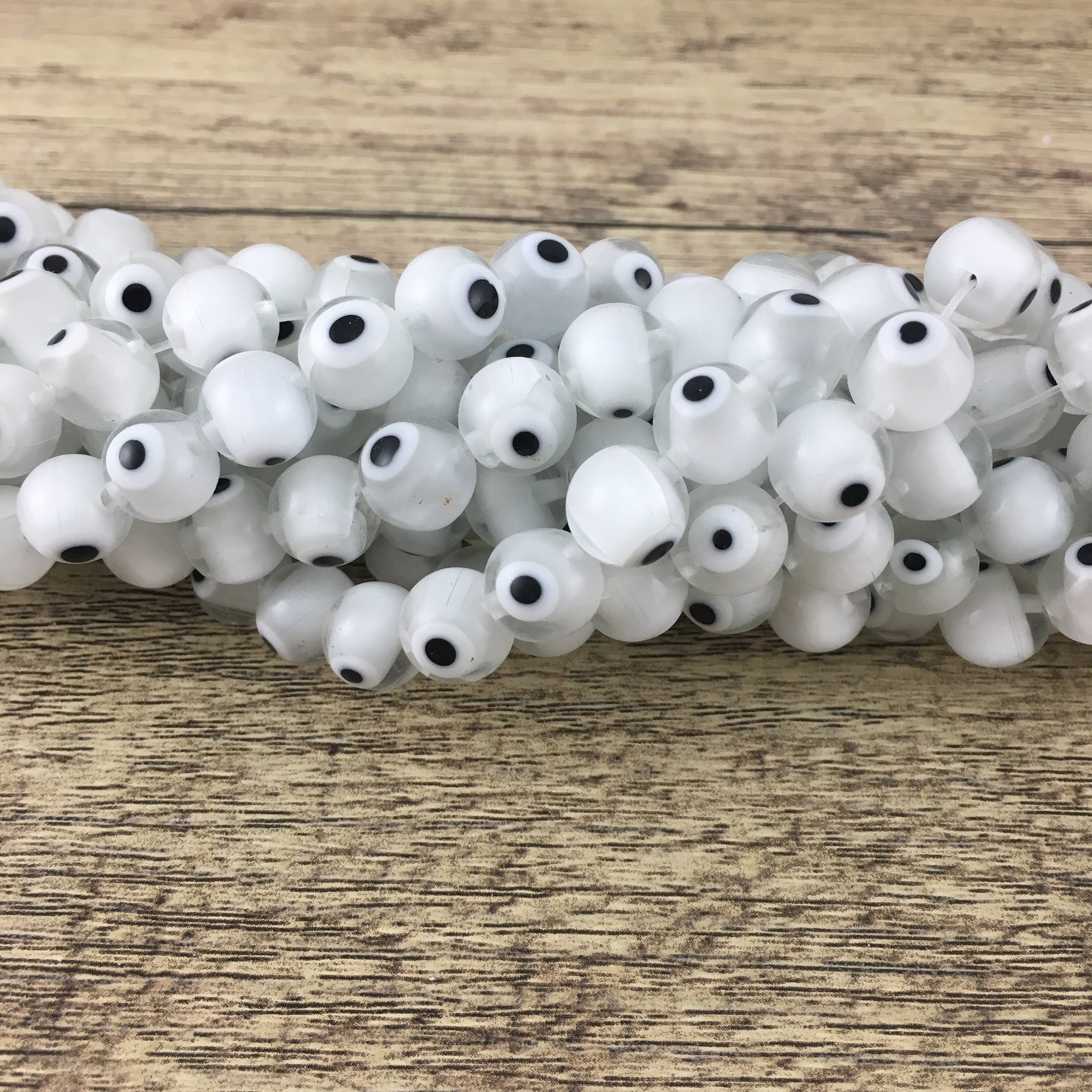 Evil Eye White Bead Strand | Bellaire Wholesale