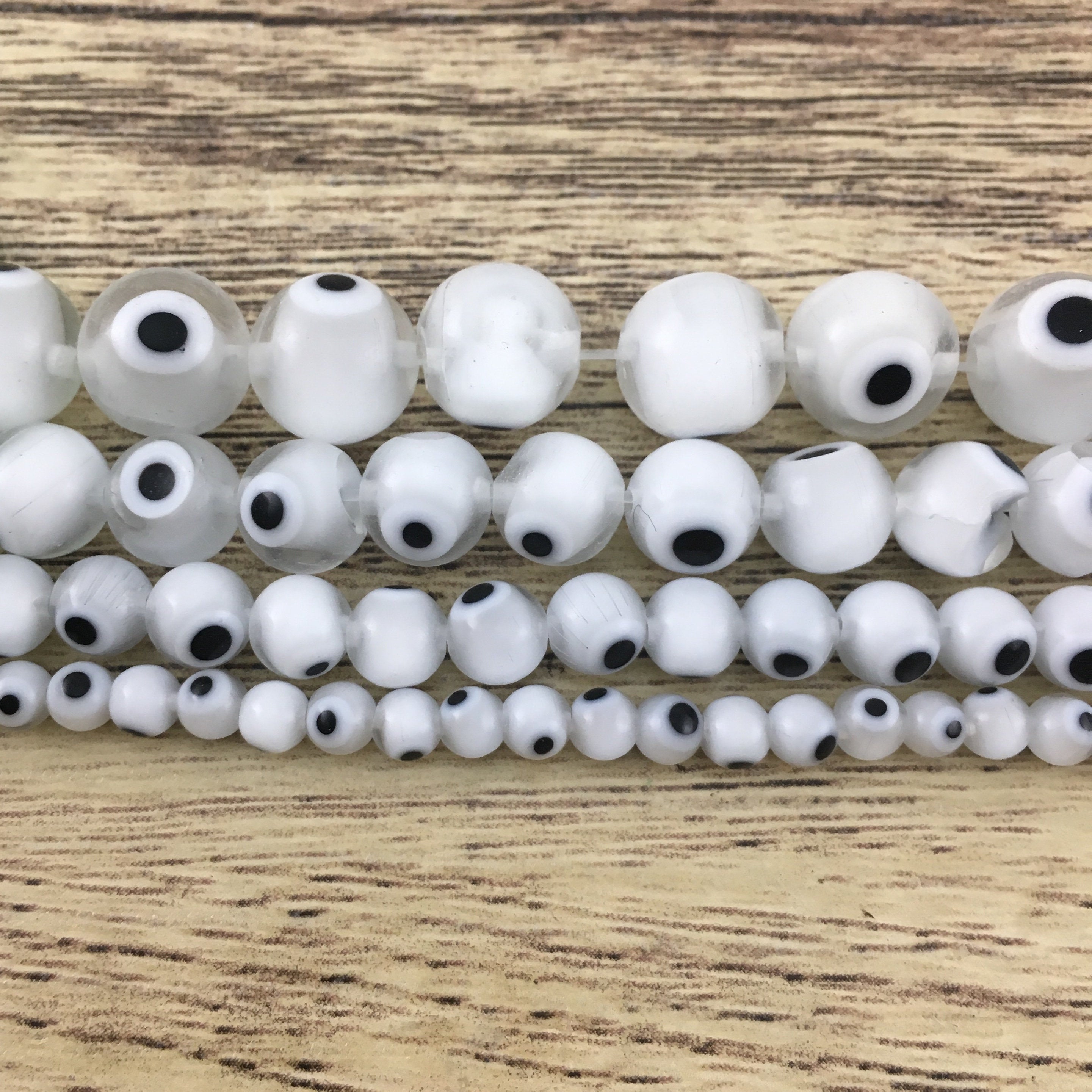 Evil Eye White Bead Strand | Bellaire Wholesale