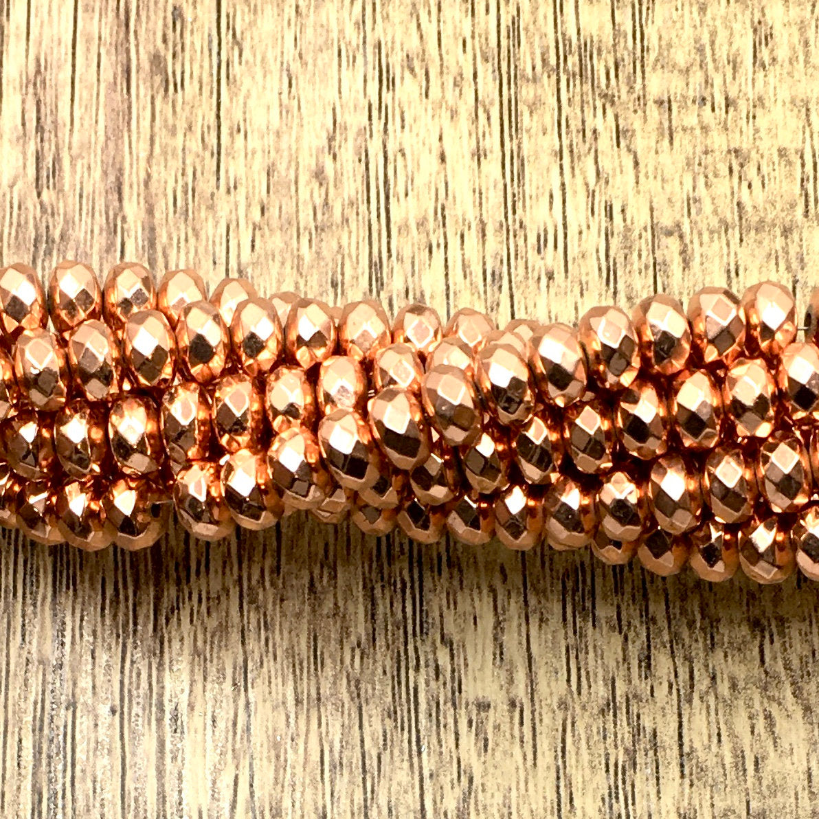 6mm Donut Rose Gold Faceted Hematite Bead | Bellaire Wholesale
