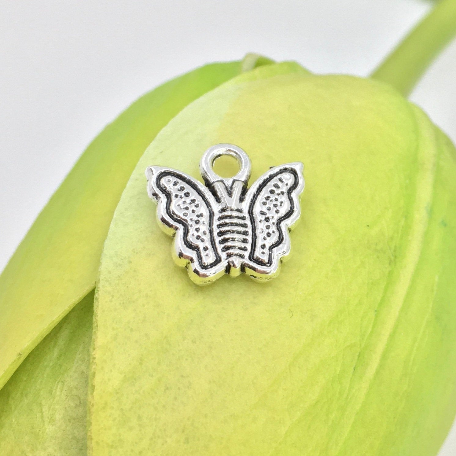 Alloy Charm, Rhodium Butterfly Charm | Bellaire Wholesale