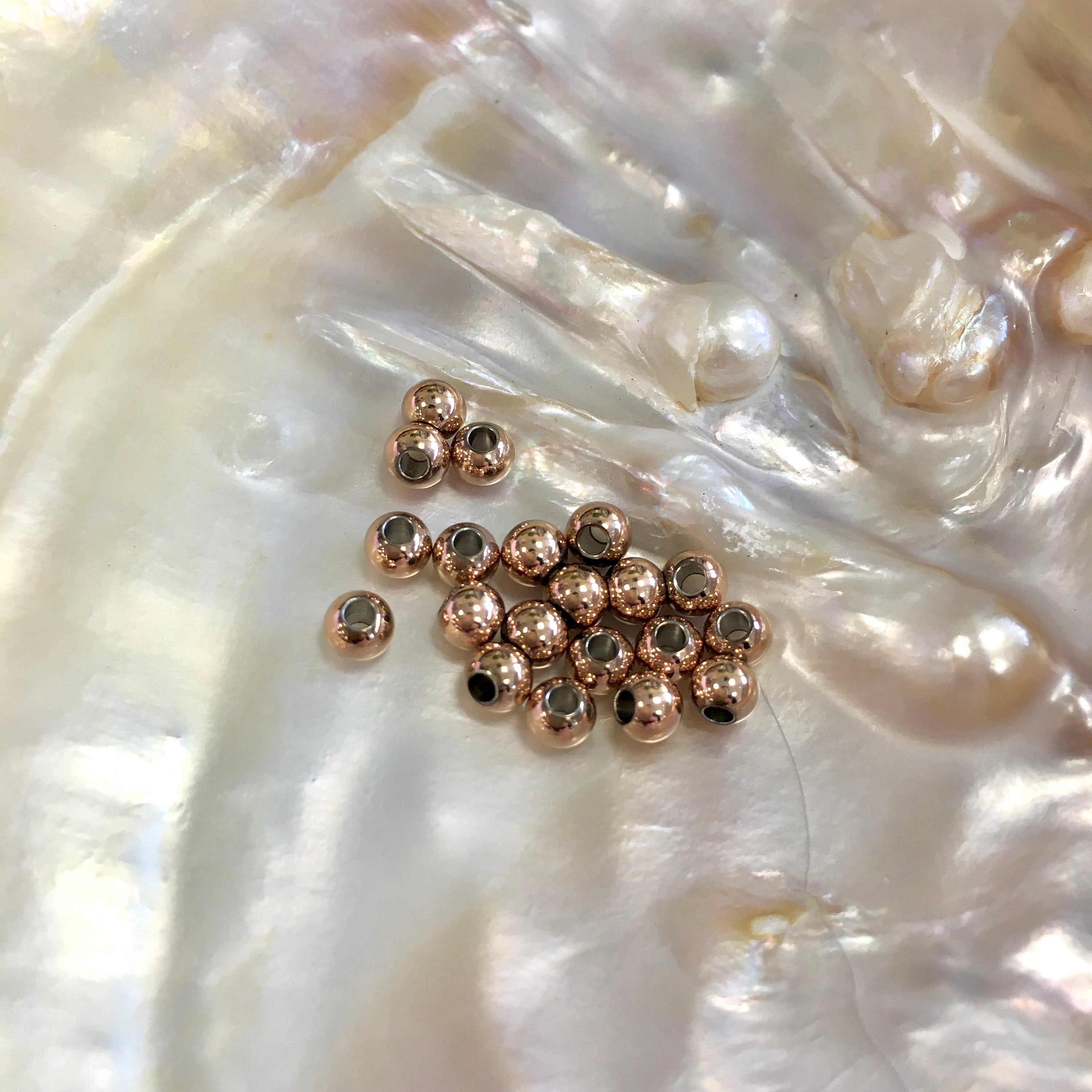 Stainless Steel Rose Gold Round Beads | Bellaire Wholesale