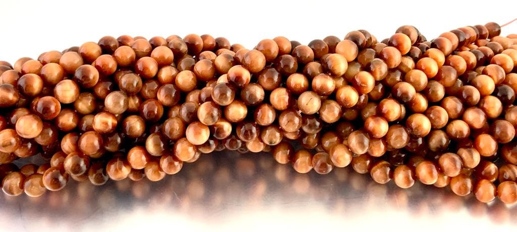 Sun Tigers eye beads, Round | Bellaire Wholesale