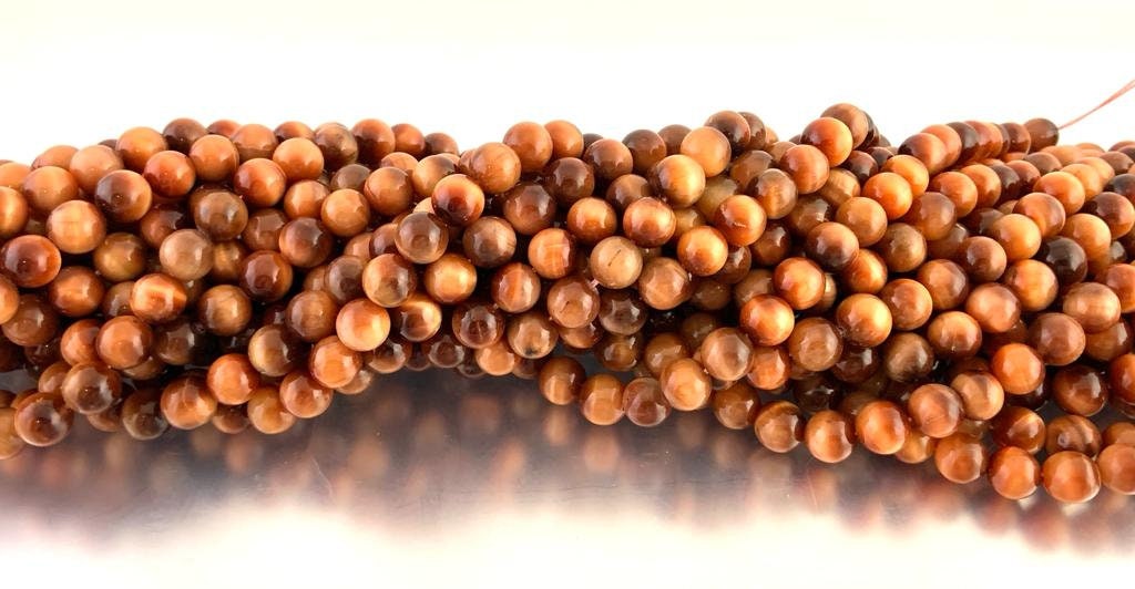 Sun Tigers eye beads, Round | Bellaire Wholesale