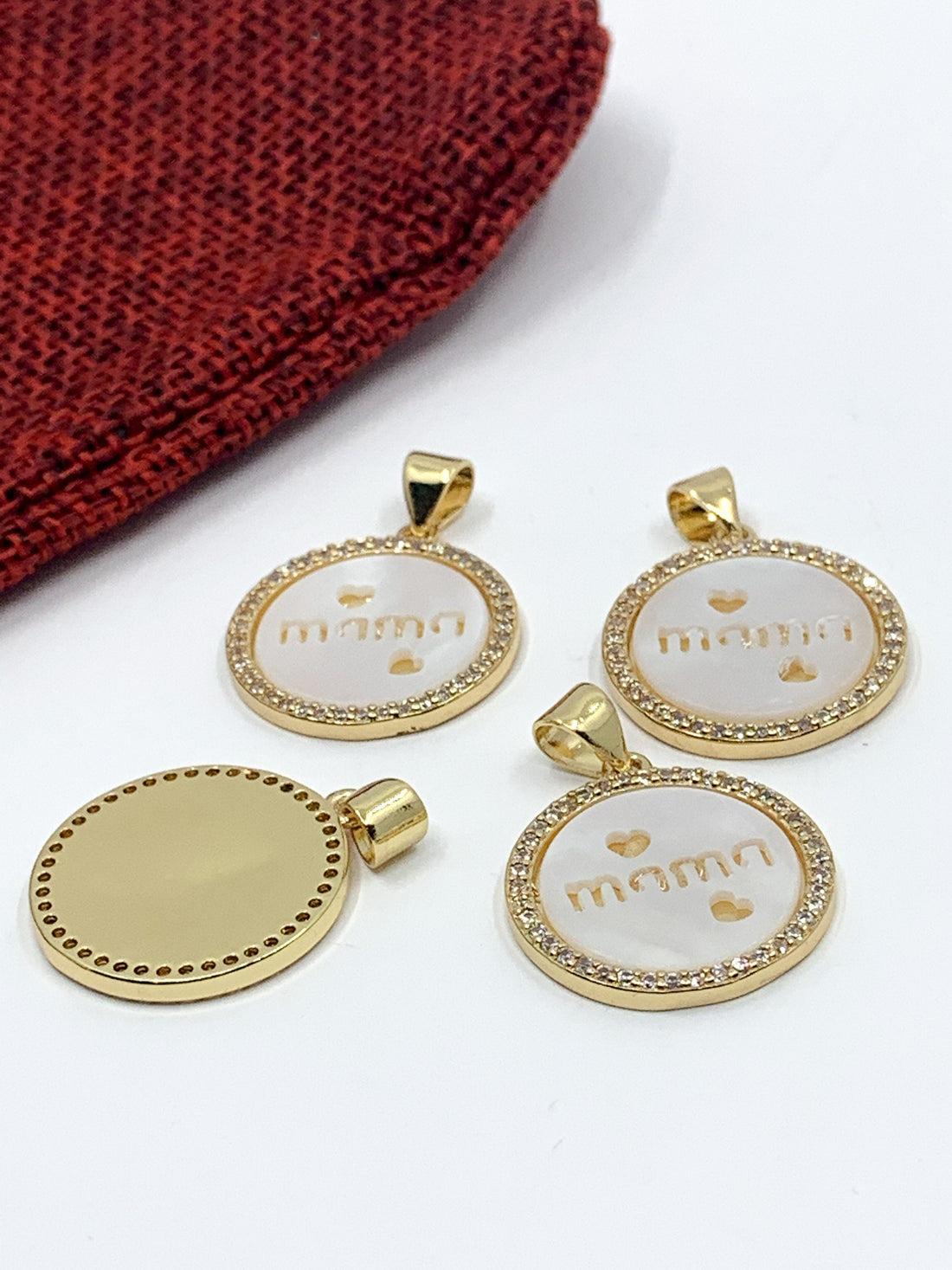 "Mama writing with 2 hearts" on flat round shell pearl charm pendant with clear cz stones around, 18k gold plated 