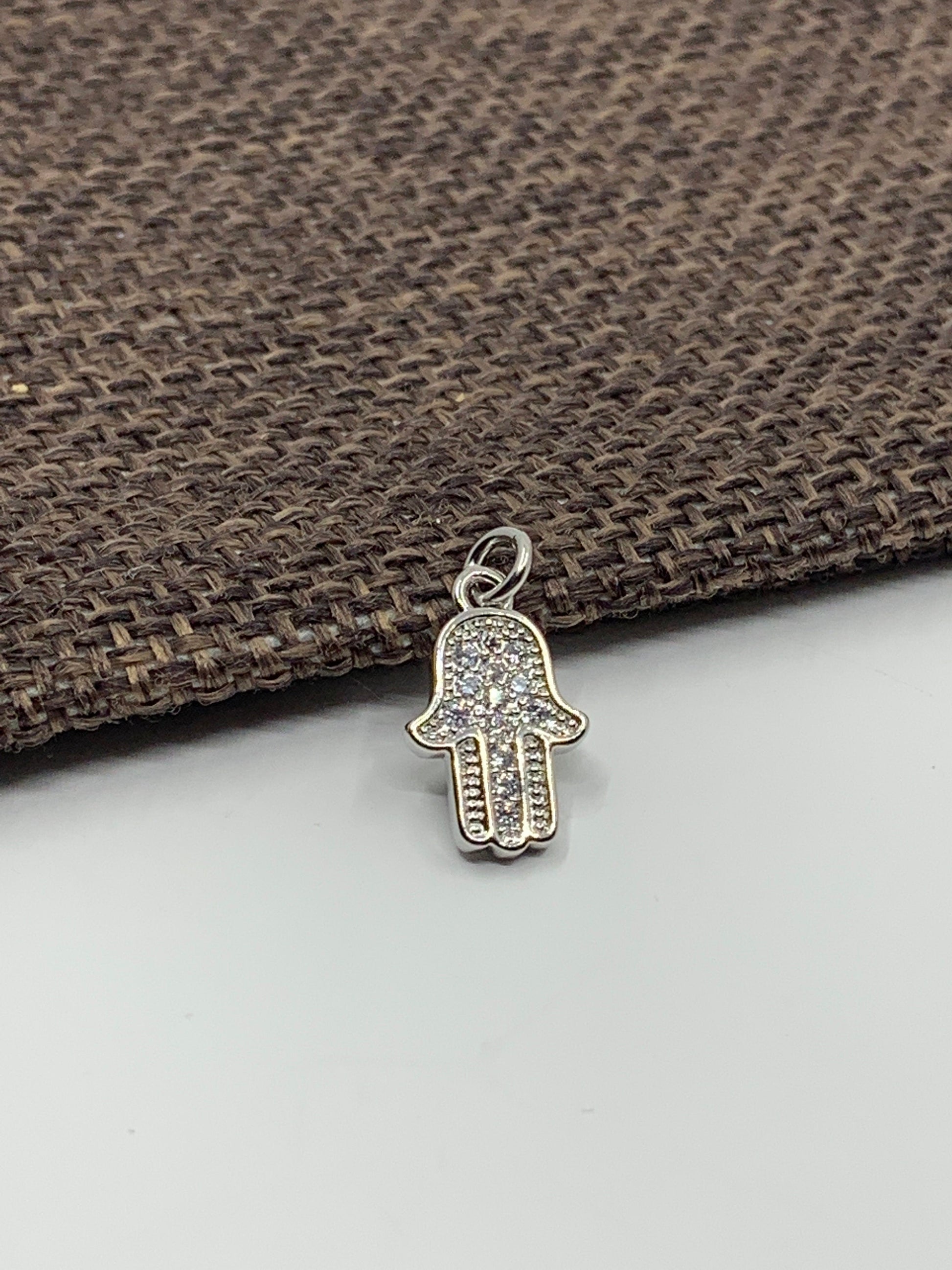 Silver hamsa hand pendant cz pave